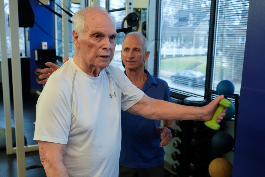 Dr. Grover Smith, left, works out with exercise scientist Dr. Irv Rubenstein, right, at STEPS Fitness, Wednesday, Feb. 12, 2025, in Nashville, Tenn. (AP Photo/George Walker IV)