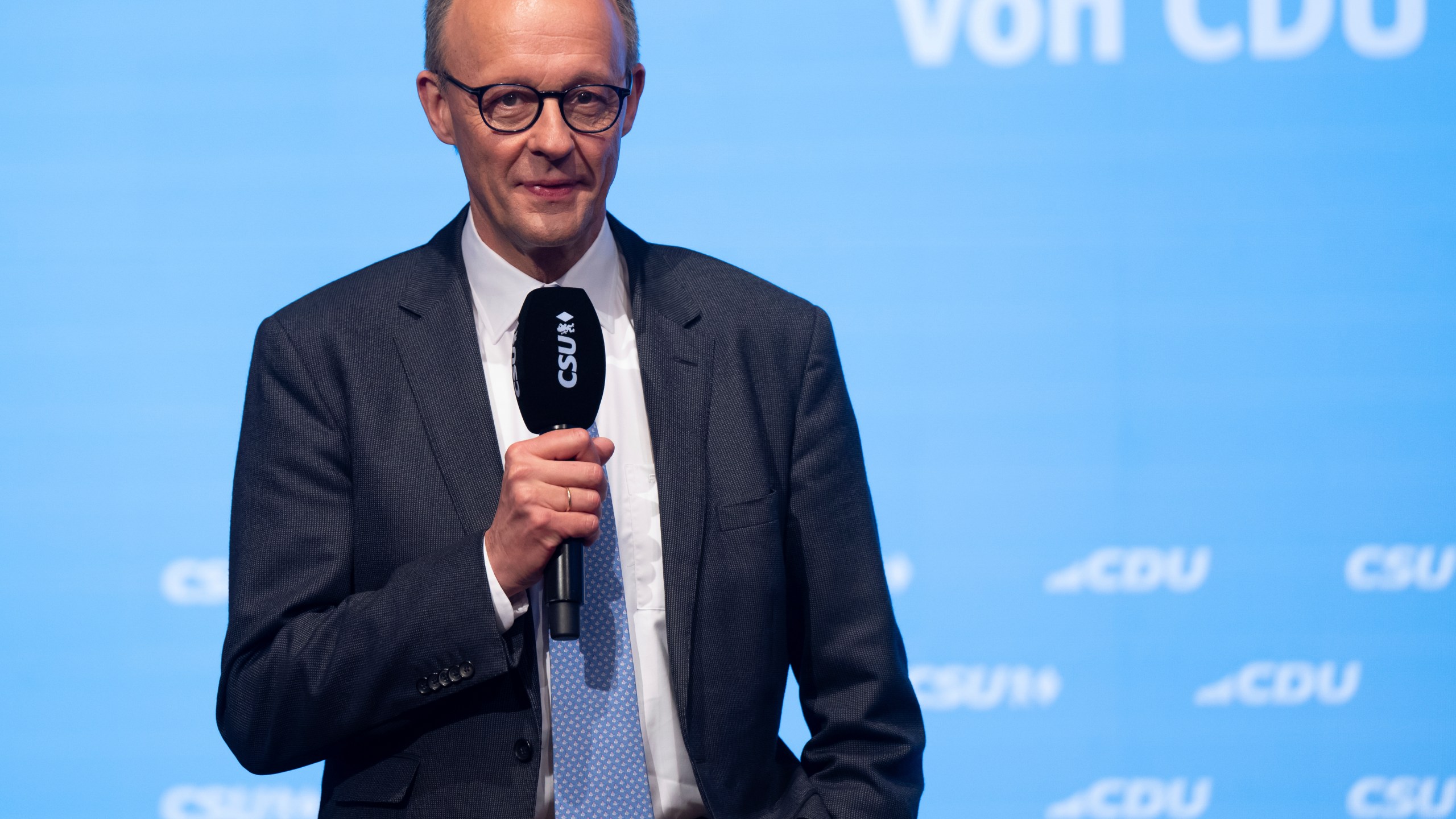 Friedrich Merz, CDU Federal Chairman and Union candidate for Chancellor, speaks at the joint CSU and CDU campaign closing for the Bundestag elections, in Munich, Germany, Saturday, Feb. 22, 2025. (Sven Hoppe/dpa via AP)