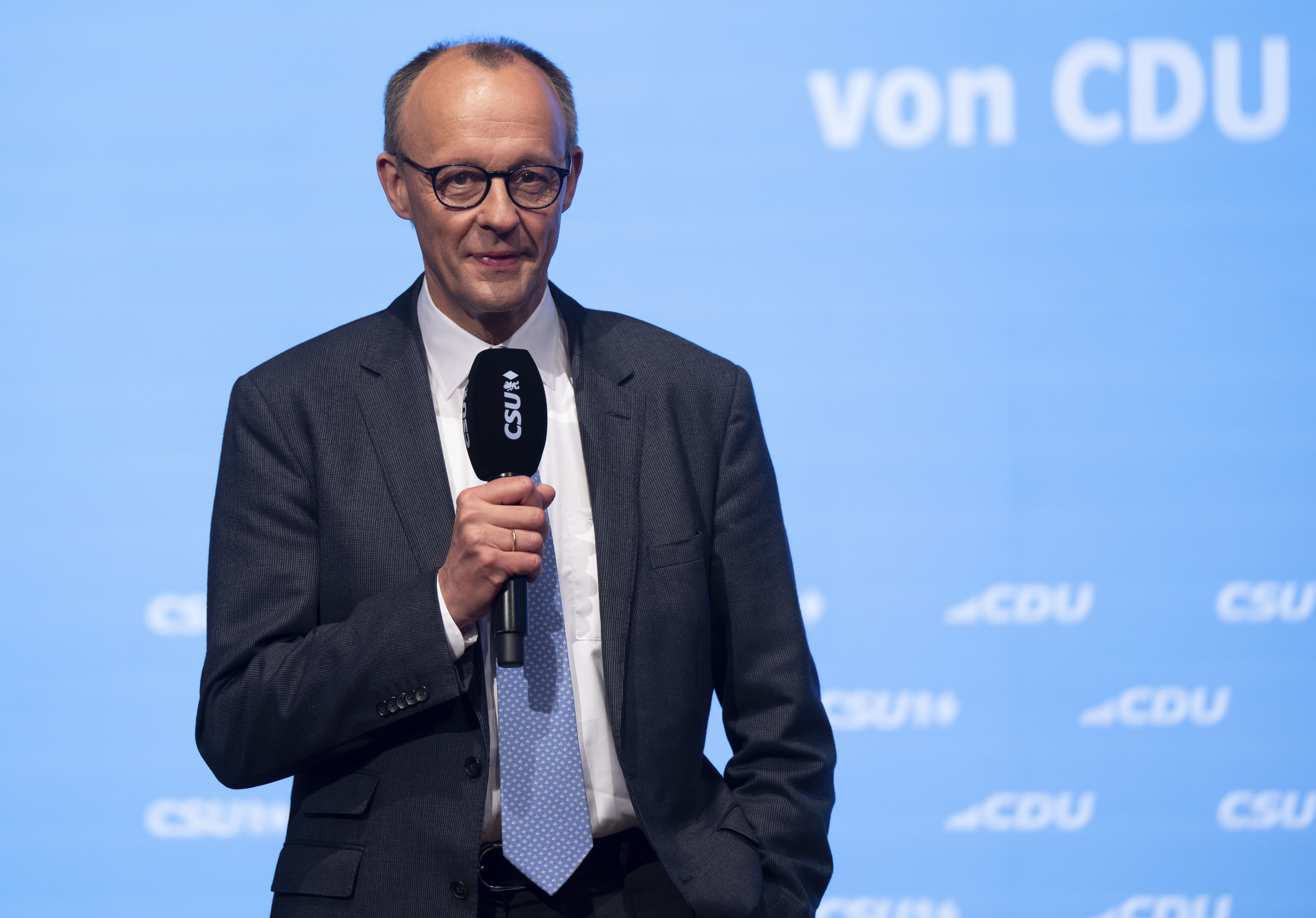 Friedrich Merz, CDU Federal Chairman and Union candidate for Chancellor, speaks at the joint CSU and CDU campaign closing for the Bundestag elections, in Munich, Germany, Saturday, Feb. 22, 2025. (Sven Hoppe/dpa via AP)