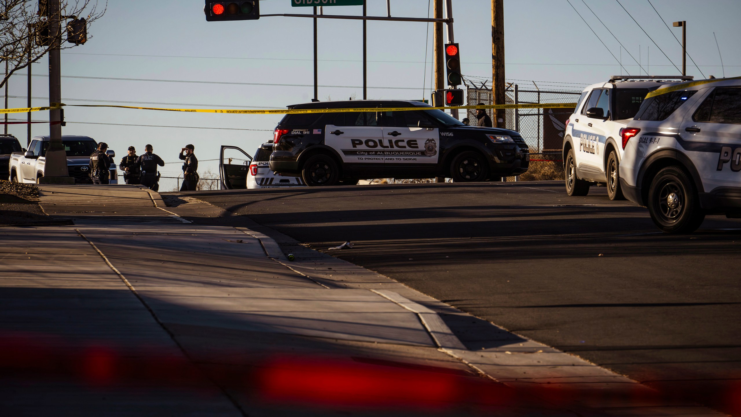 Police respond to a deadly shooting at Kirtland Air Force Base in Albuquerque, N.M., early Saturday, Feb. 22, 2025. (Chancey Bush/The Albuquerque Journal via AP)