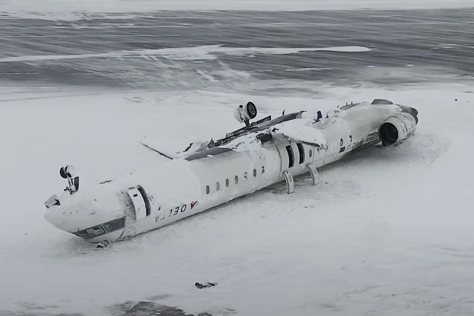 This image taken from video released by the Transportation Safety Board of Canada on Wednesday, Feb. 19, 2025, shows the crashed plane of Delta flight 4819 at Toronto Pearson International Airport, in Mississauga, Ontario, on Tuesday, Feb. 18. (Transportation Safety Board of Canada via AP)