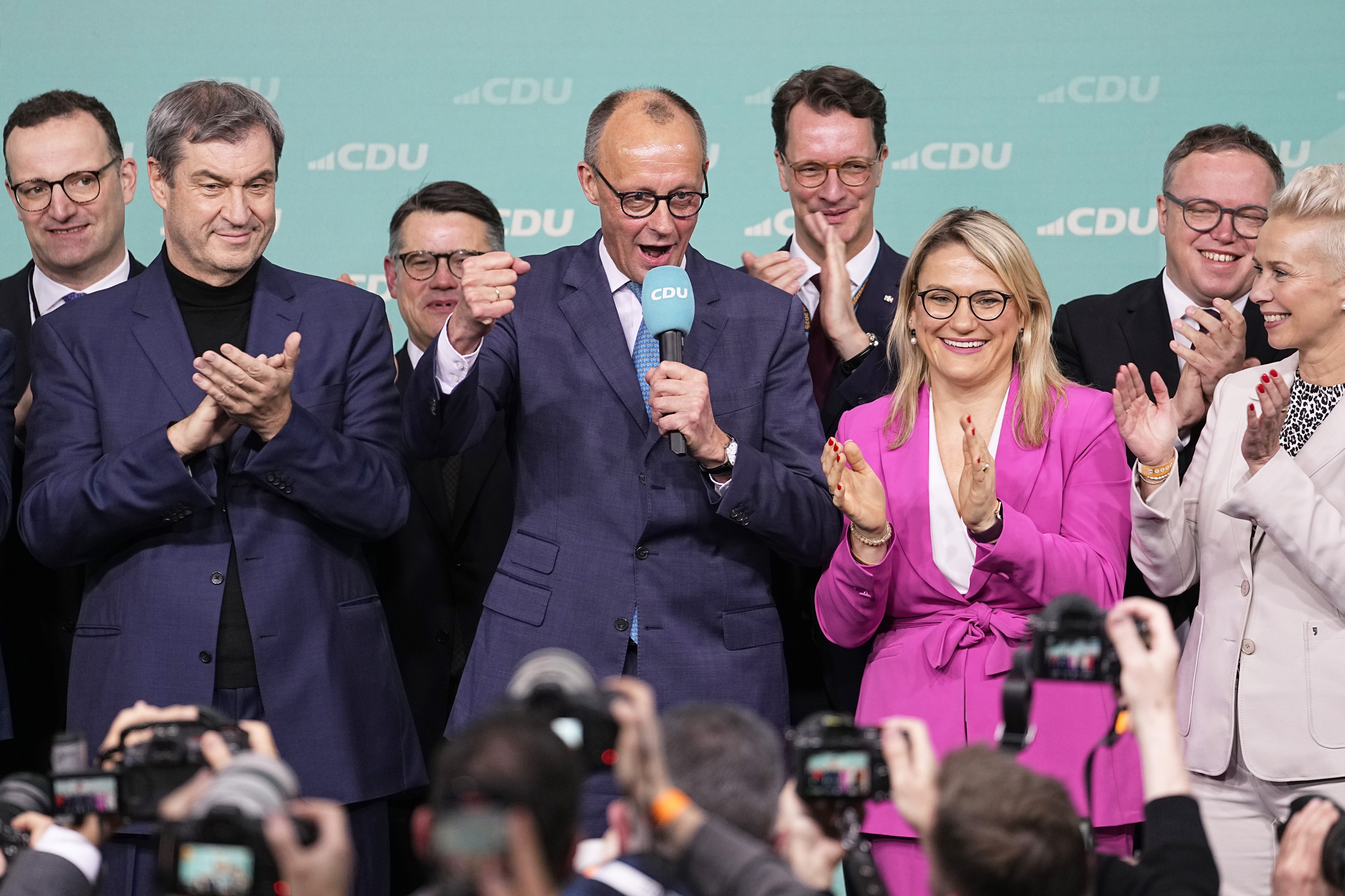 Friedrich Merz, the candidate of the mainstream conservative Christian Democratic Union party, addresses supporters at the party headquarters in Berlin, Germany, Sunday, Feb. 23, 2025, after the German national election. (AP Photo/Martin Meissner)