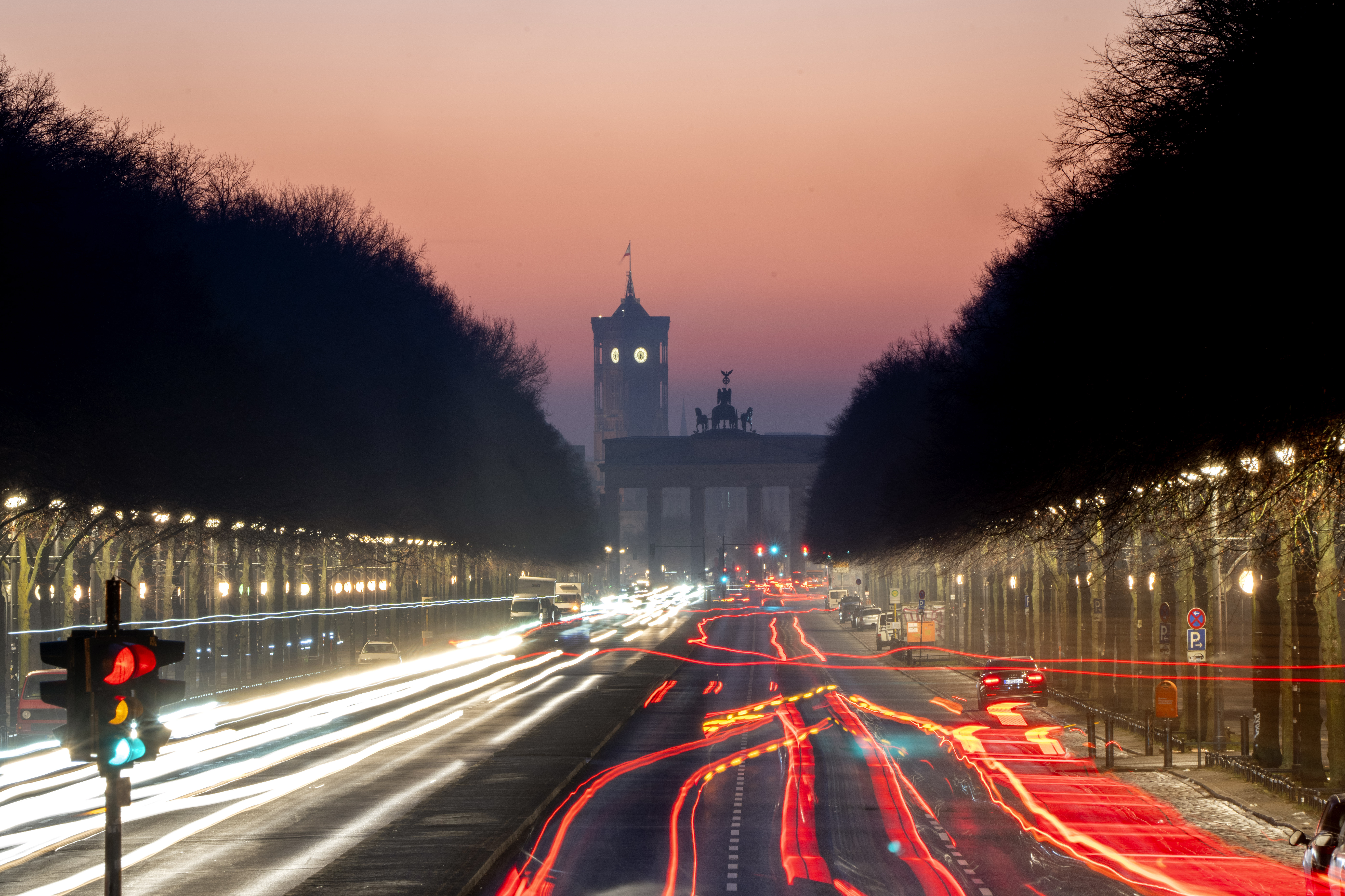 Cars move towards the Brandenburg Gate on the 17th of June Street in Berlin , Germany, Monday, Feb. 24, 2025, the day after the German election. (AP Photo/Michael Probst)