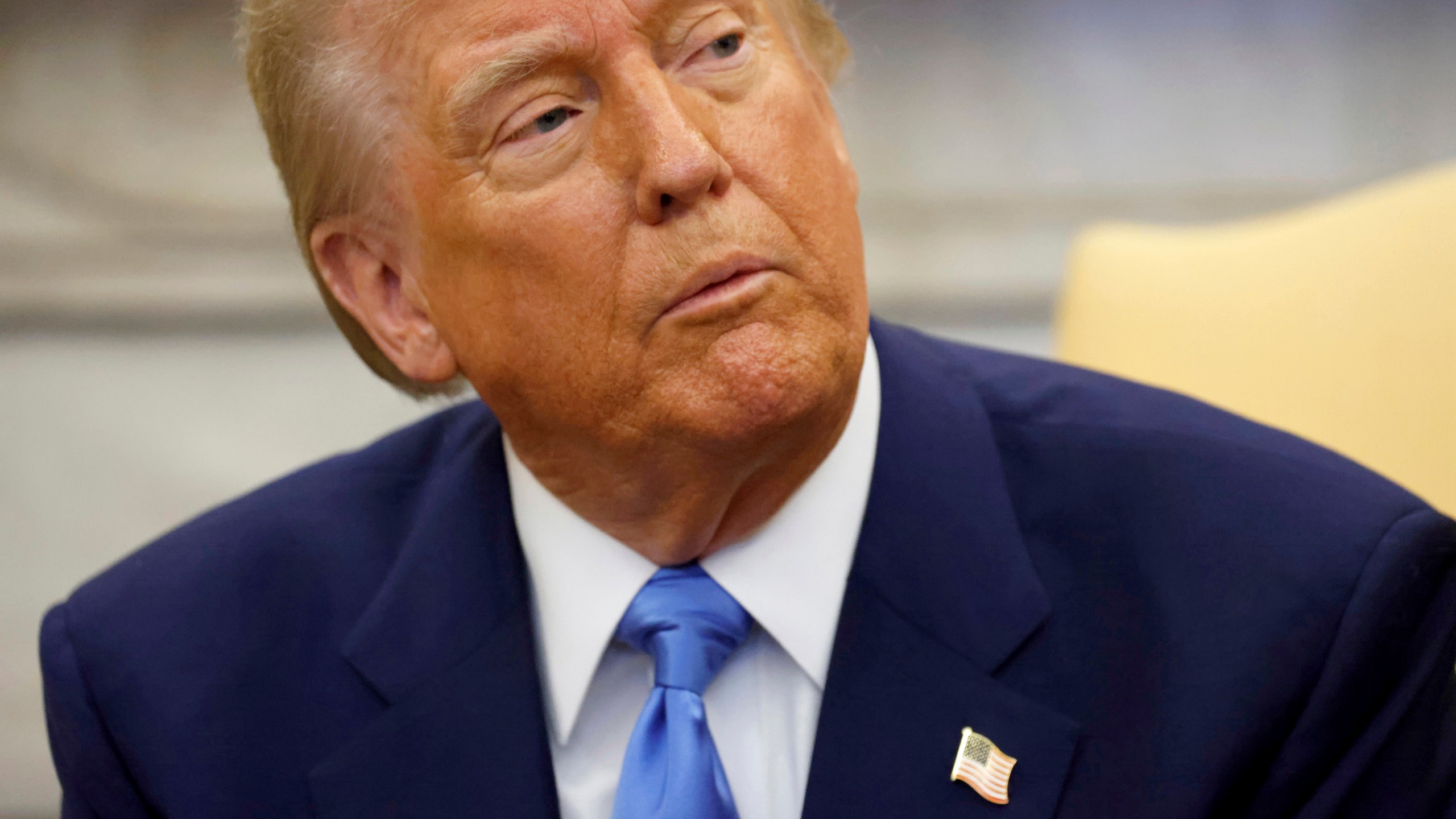 President Donald Trump speaks during a meeting with France's President Emmanuel Macron in the Oval Office of the White House in Washington, Monday, Feb. 24, 2025. (Ludovic Marin/Pool via AP)