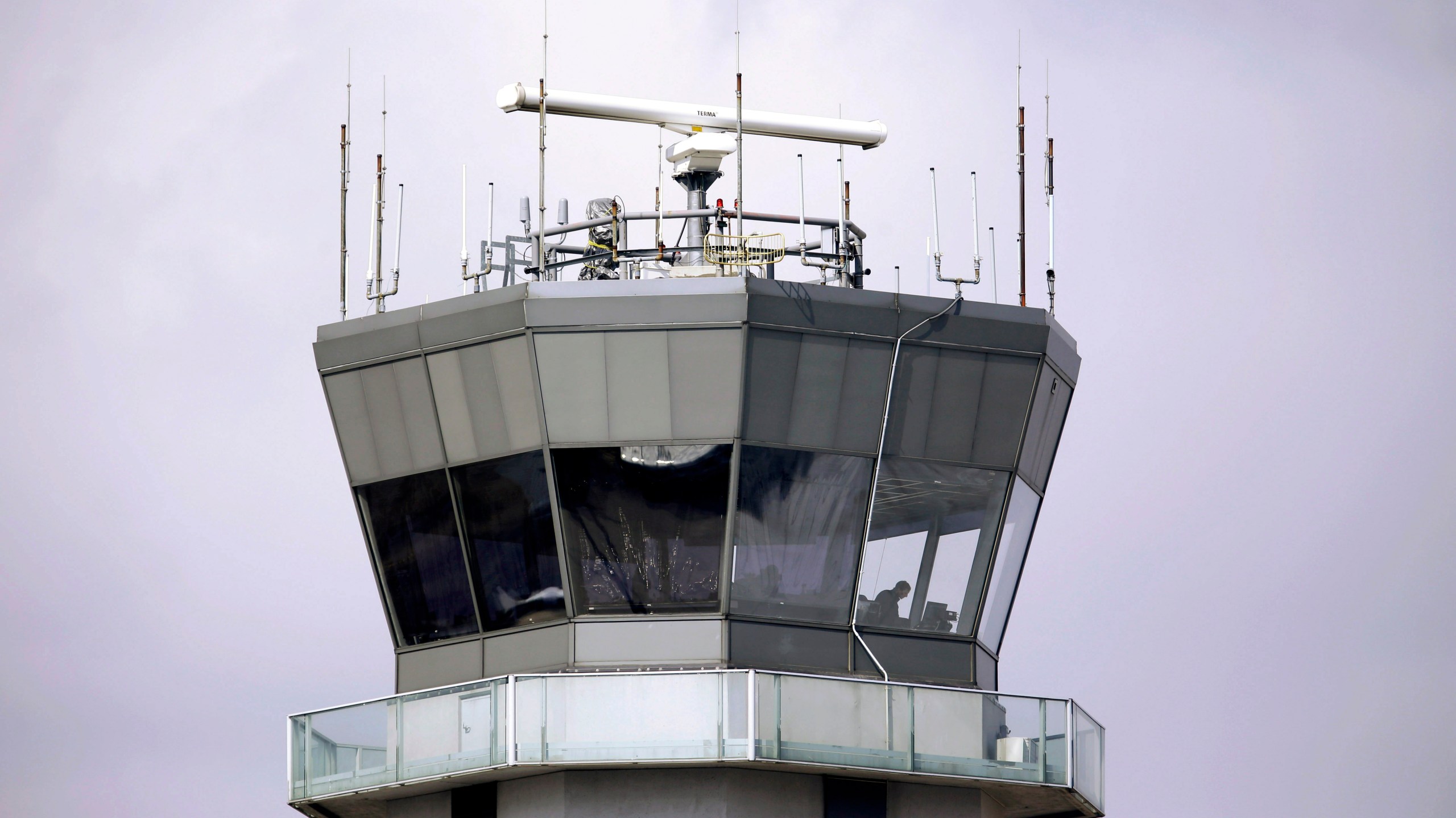 FILE - The air traffic control tower stands at Chicago's Midway International Airport, March 12, 2013. (AP Photo/M. Spencer Green, File)