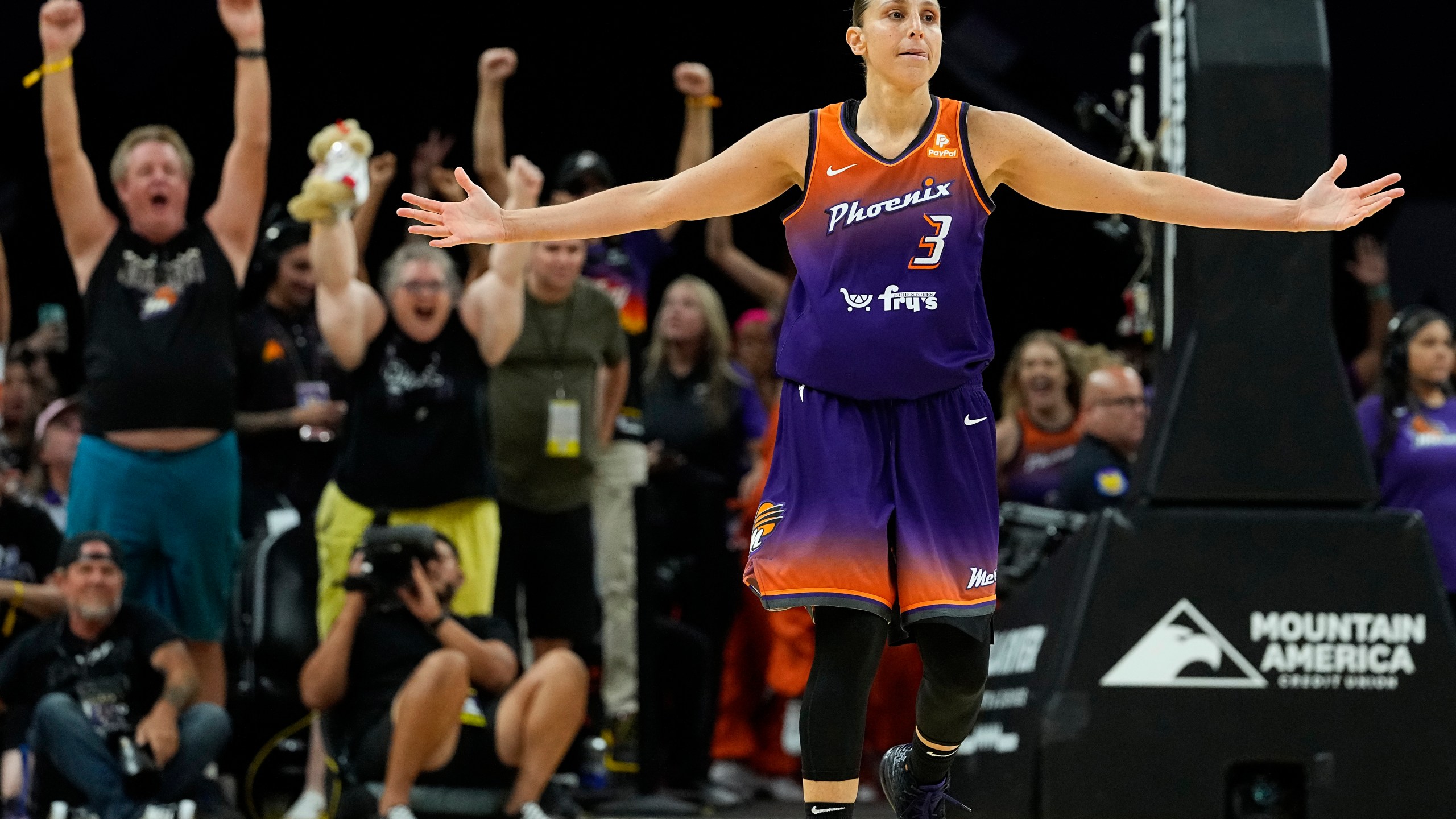 FILE - Phoenix Mercury's Diana Taurasi (3) celebrates after making her 10,000th career point during the second half of a WNBA basketball game against the Atlanta Dream, Thursday, Aug. 3, 2023, in Phoenix. (AP Photo/Matt York, File)