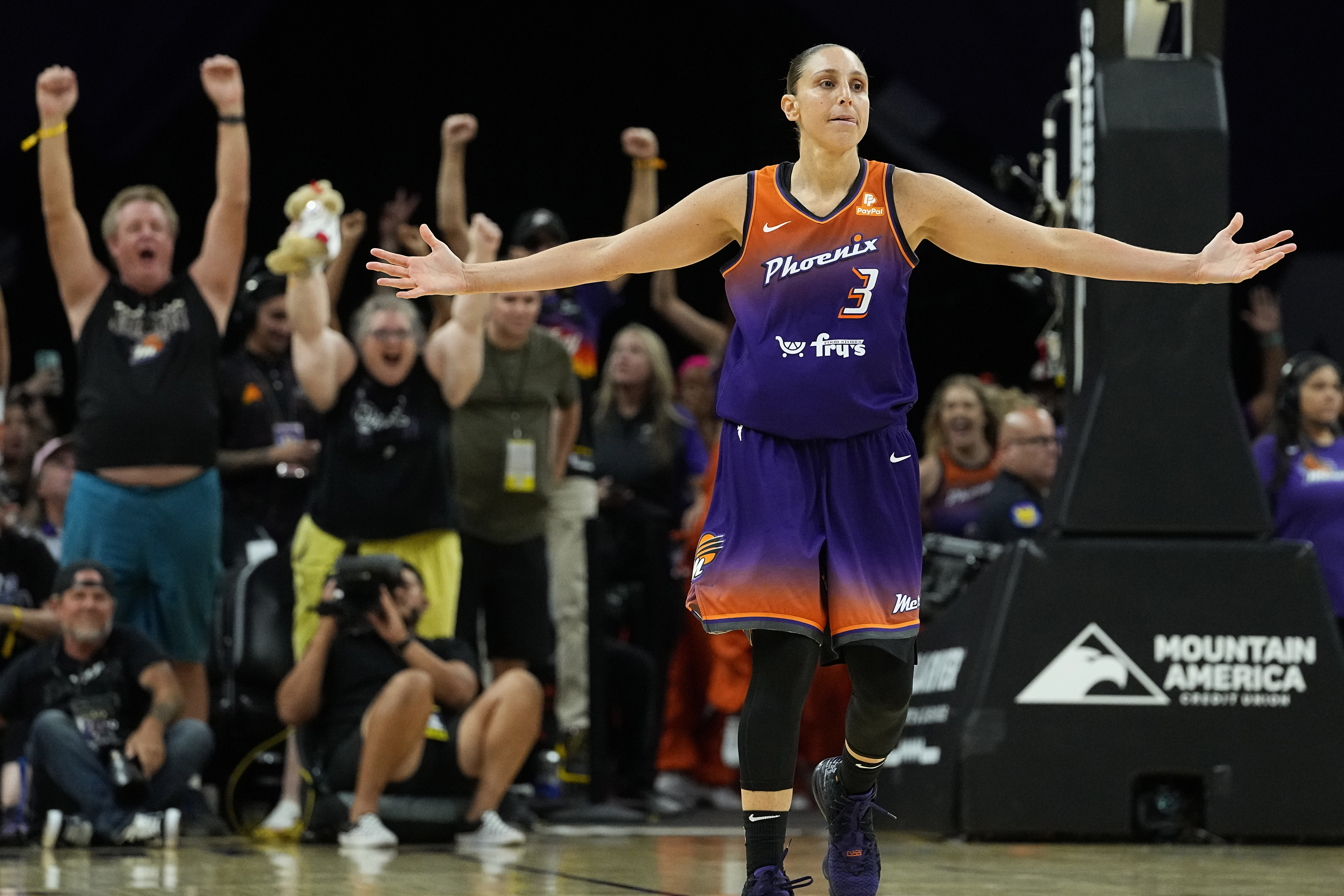 FILE - Phoenix Mercury's Diana Taurasi (3) celebrates after making her 10,000th career point during the second half of a WNBA basketball game against the Atlanta Dream, Thursday, Aug. 3, 2023, in Phoenix. (AP Photo/Matt York, File)