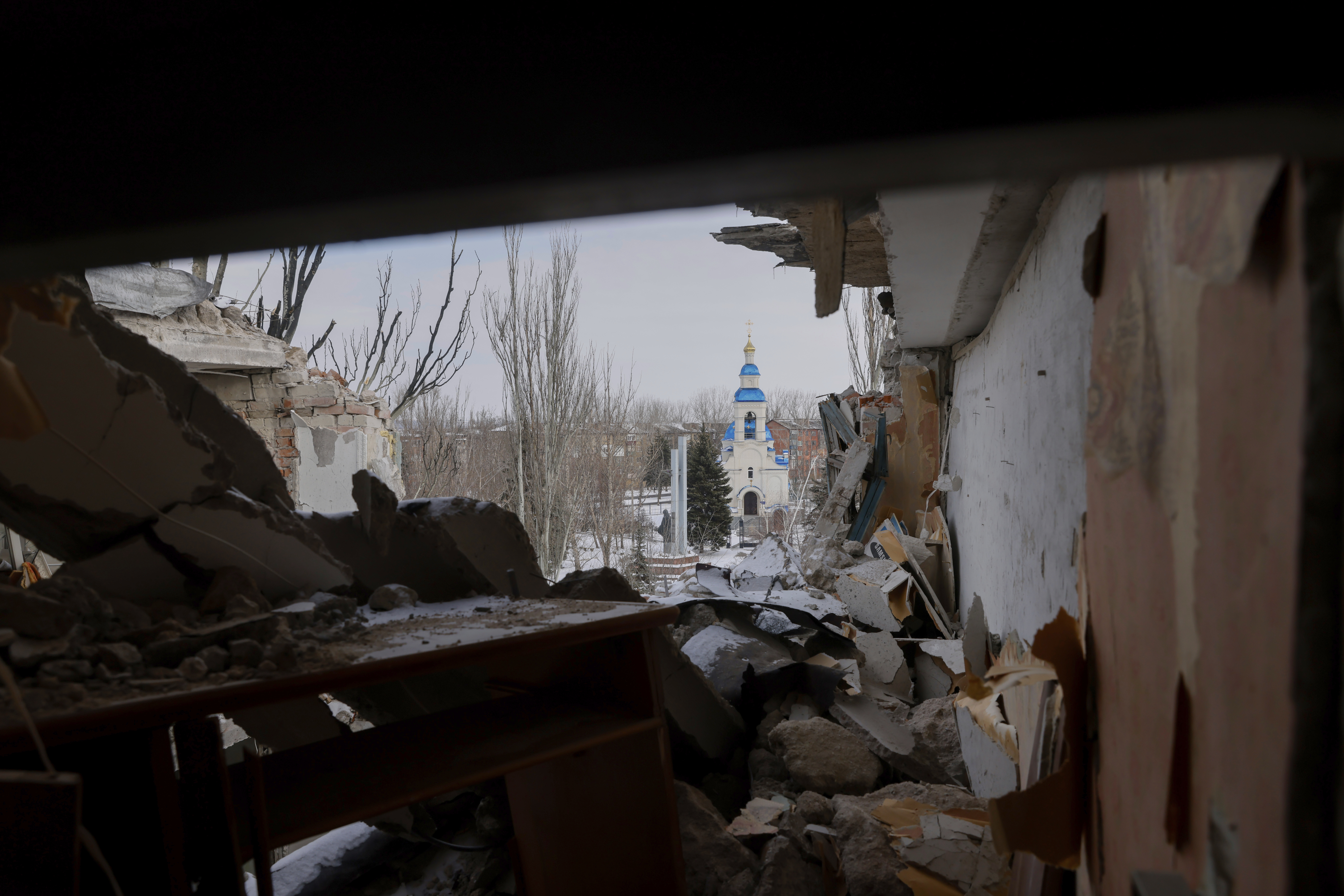 A damaged apartment building is seen after a Russian guided aircraft bomb attack in Kostiantynivka, Donetsk region, Ukraine, Monday, Feb. 24, 2025. (AP Photo/Yevhen Titov)