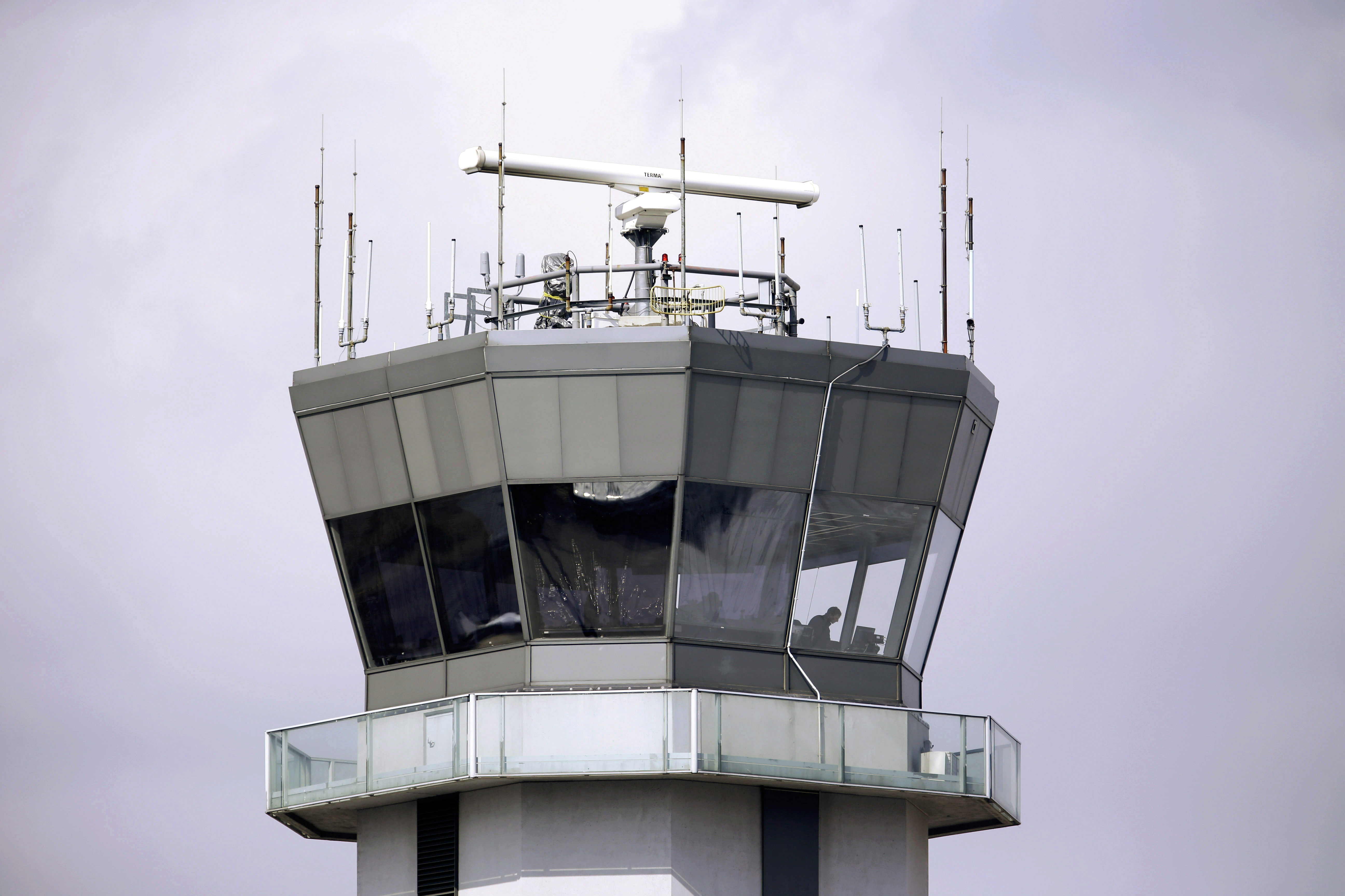 FILE - The air traffic control tower stands at Chicago's Midway International Airport, March 12, 2013. (AP Photo/M. Spencer Green, File)