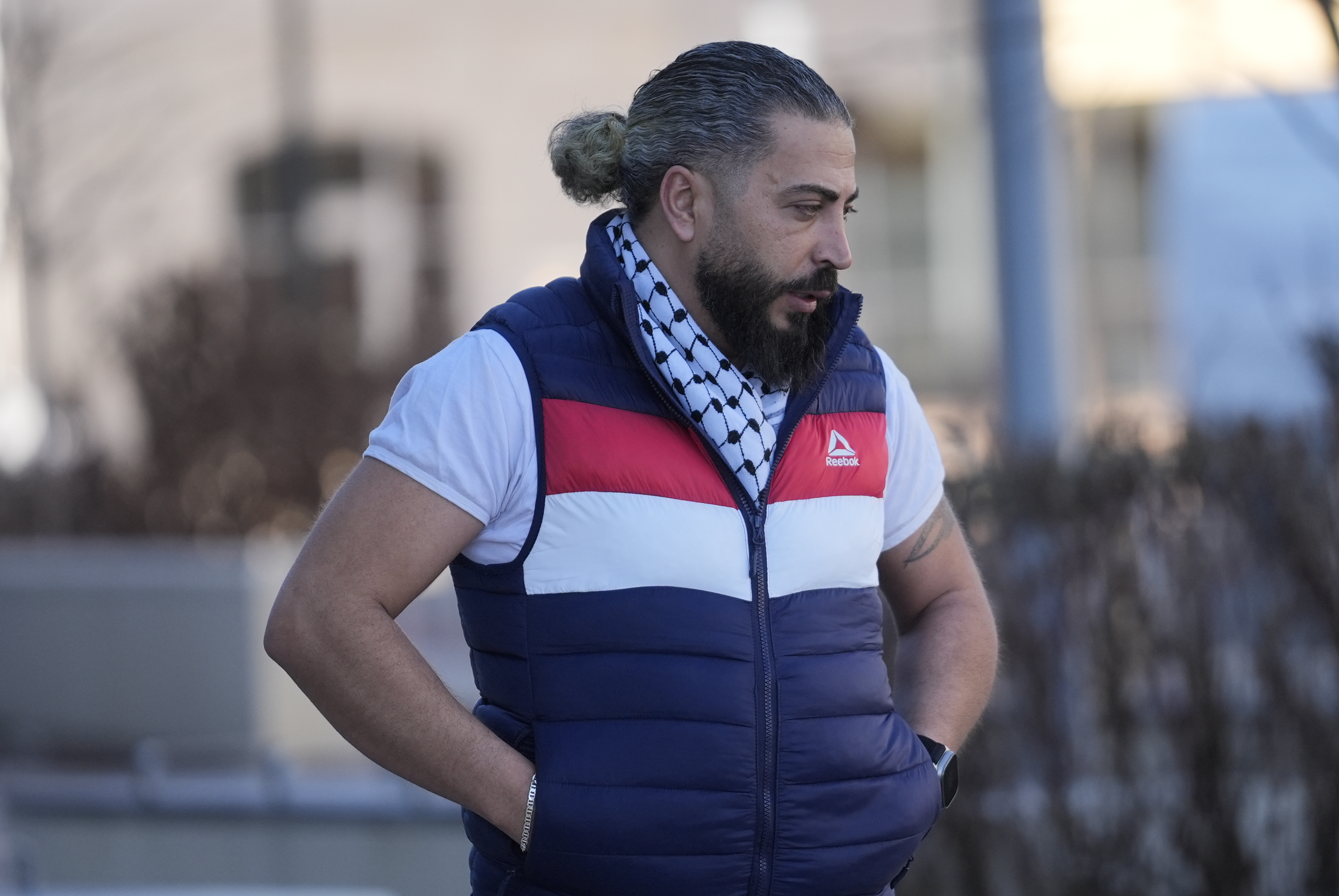 Odai Alfayoumi, father of six-year-old Palestinian boy Wadee Alfayoumi, enters Will County Courthouse where Joseph Czuba, 73, is charged with and on trial in the fatal stabbing of the boy and the wounding of his mother Hanan Shaheen, Tuesday, Feb. 25, 2025, in Joliet, Ill. (AP Photo/Erin Hooley)