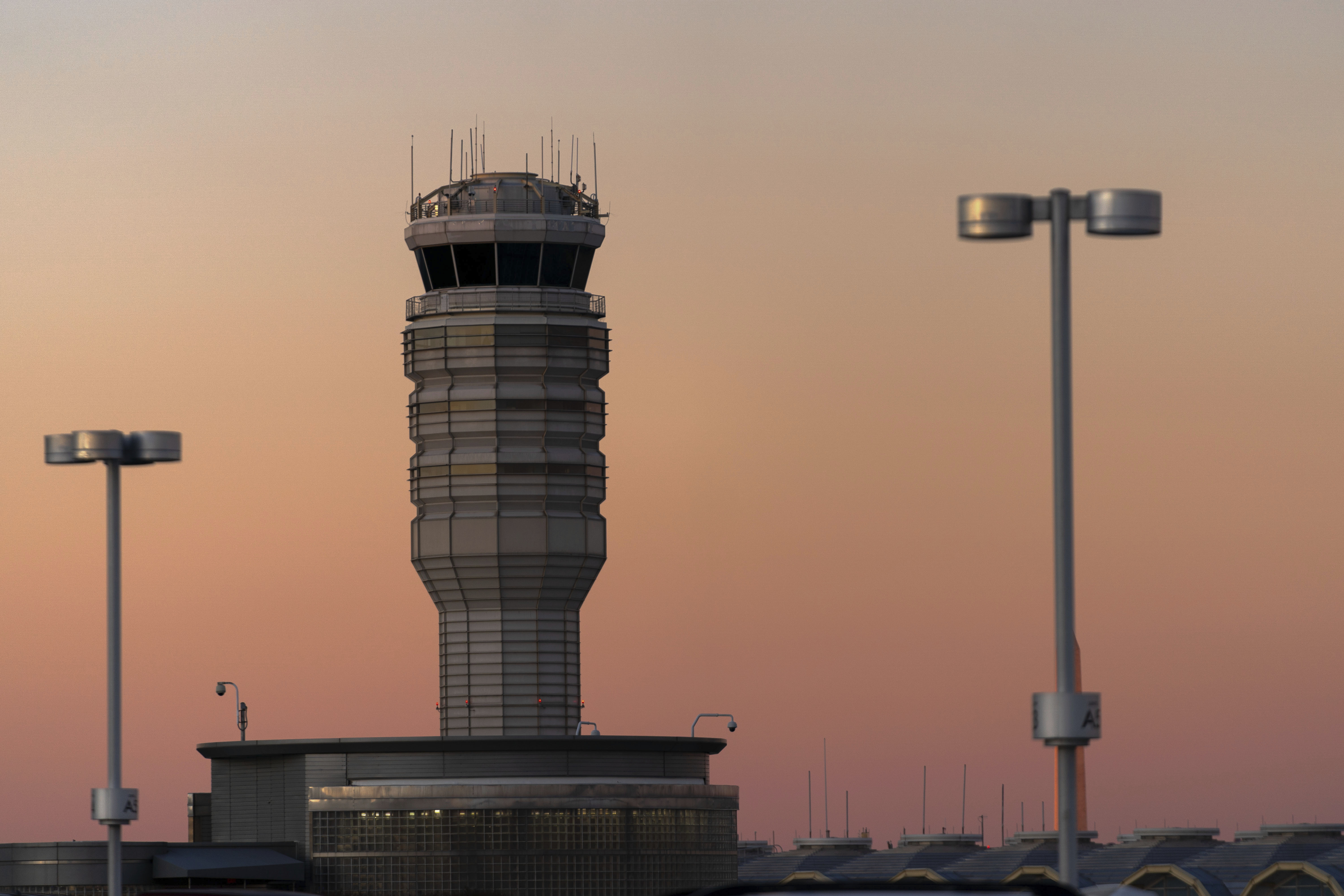 FILE - The air traffic control tower at Ronald Reagan Washington National Airport is seen at sunset, Saturday, Feb. 1, 2025, in Arlington, Va.. (AP Photo/Jose Luis Magana, file)