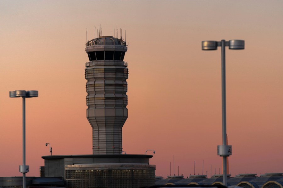 FILE - The air traffic control tower at Ronald Reagan Washington National Airport is seen at sunset, Saturday, Feb. 1, 2025, in Arlington, Va.. (AP Photo/Jose Luis Magana, file)