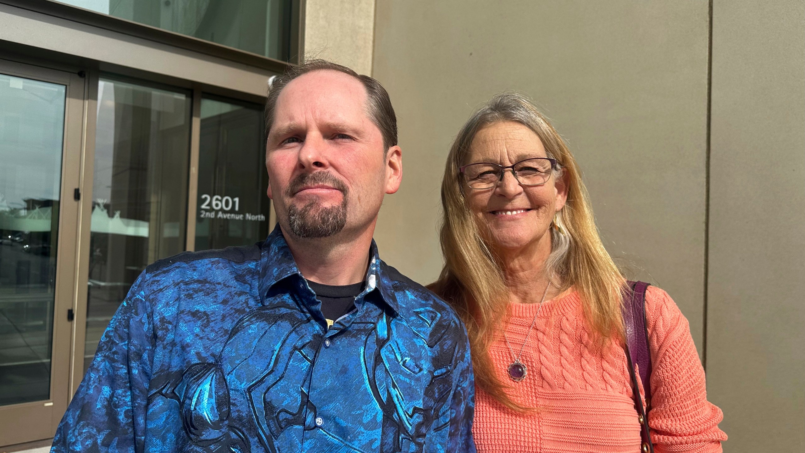 FILE - Richard Rogers and his wife Laurie stand outside the James F. Battin Federal Courthouse, Tuesday, Oct. 1, 2024, in Billings, Mont. (AP Photo/Matthew Brown, File)