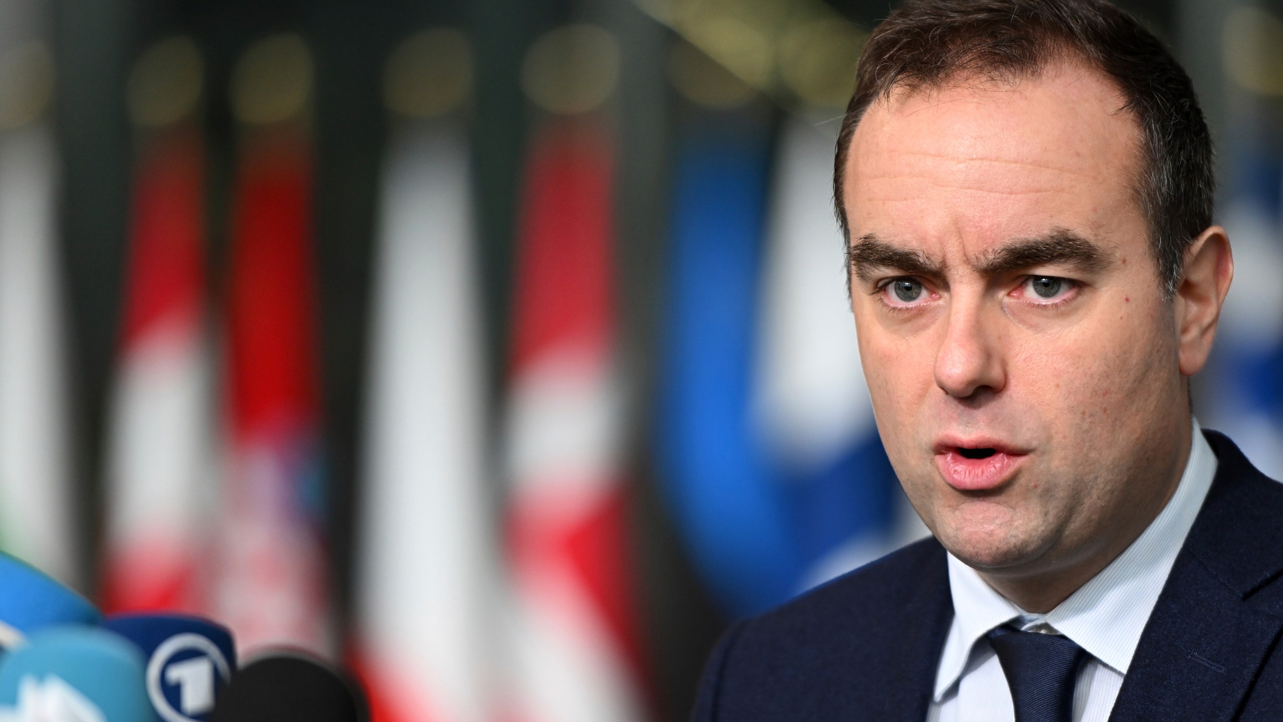 French Defense Minister Sebastien Lecornu speaks with the media as he arrives for a meeting of NATO defense ministers at NATO headquarters in Brussels, Thursday, Feb. 13, 2025. (AP Photo/Harry Nakos)