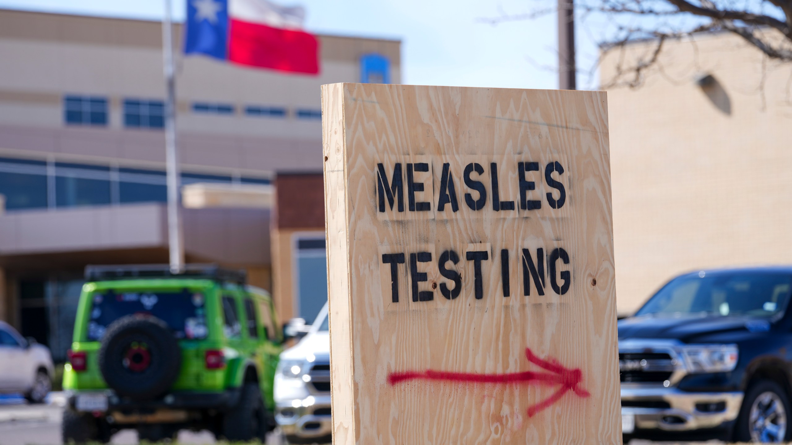 FILE -A sign is seen outside of Seminole Hospital District offering measles testing, Feb. 21, 2025, in Seminole, Texas. (AP Photo/Julio Cortez), File)