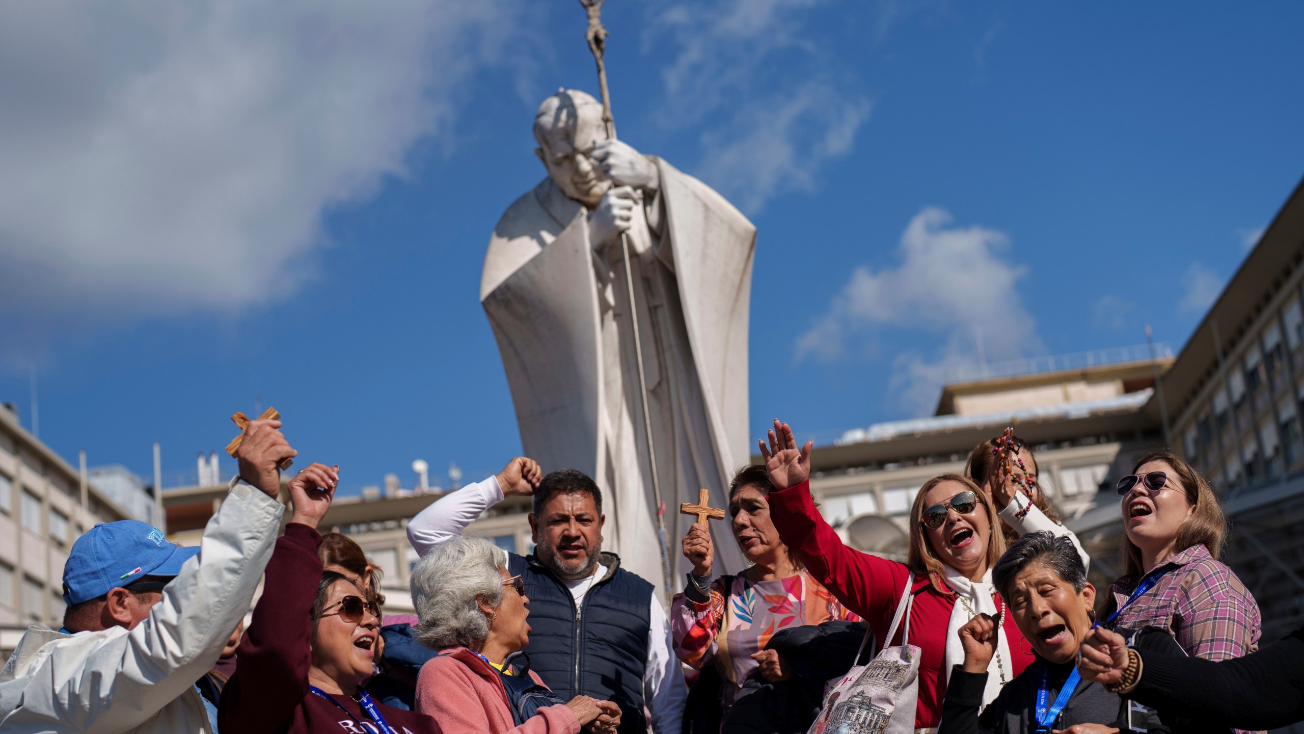 Catholic pilgrims from Mexico gather outside the Agostino Gemelli Polyclinic where Pope Francis continues to be hospitalized in Rome, Thursday, Feb. 27, 2025. (AP Photo/Bernat Armangue)