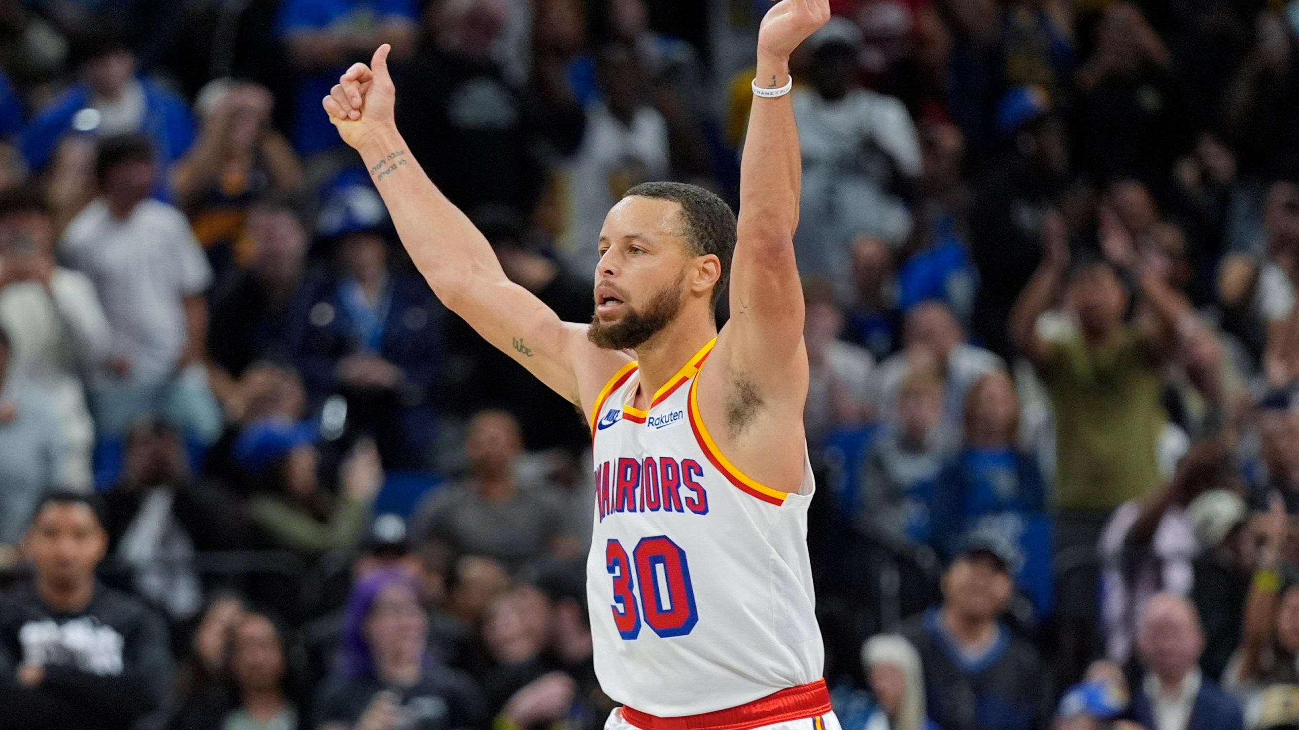 Golden State Warriors guard Stephen Curry (30) celebrates after making a 3-point shot against the Orlando Magic during the second half of an NBA basketball game, Thursday, Feb. 27, 2025, in Orlando, Fla. (AP Photo/John Raoux)