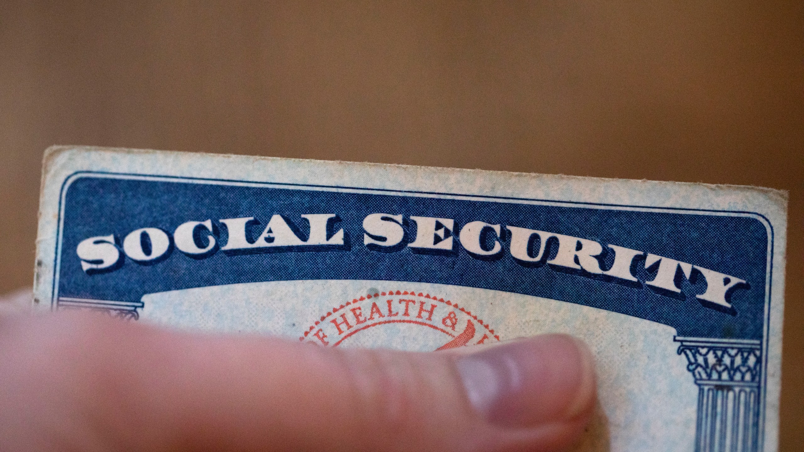 FILE - A Social Security card is displayed Oct. 12, 2021, in Tigard, Ore. (AP Photo/Jenny Kane, File)