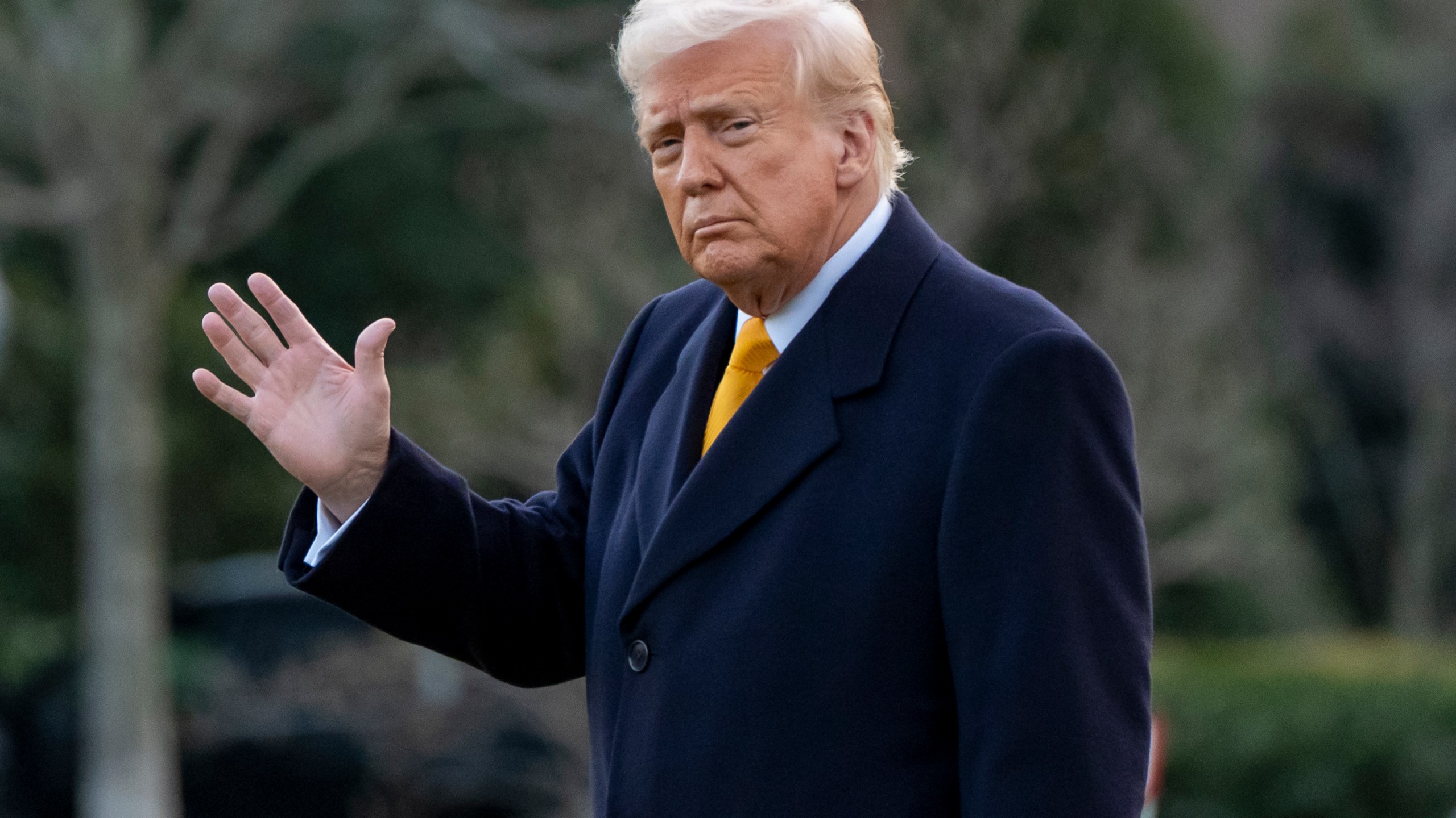 President Donald Trump waves before departing on Marine One from the South Lawn of the White House, Friday, March 7, 2025, in Washington. (AP Photo/Alex Brandon)