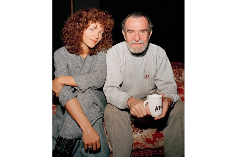 FILE - Actress Amy Irving sits with actor-director-playwright Athol Fugard during rehearsals of the play "The Road to Mecca" on Feb. 29, 1988 in New York. (AP Photo/Mario Cabrera, File)