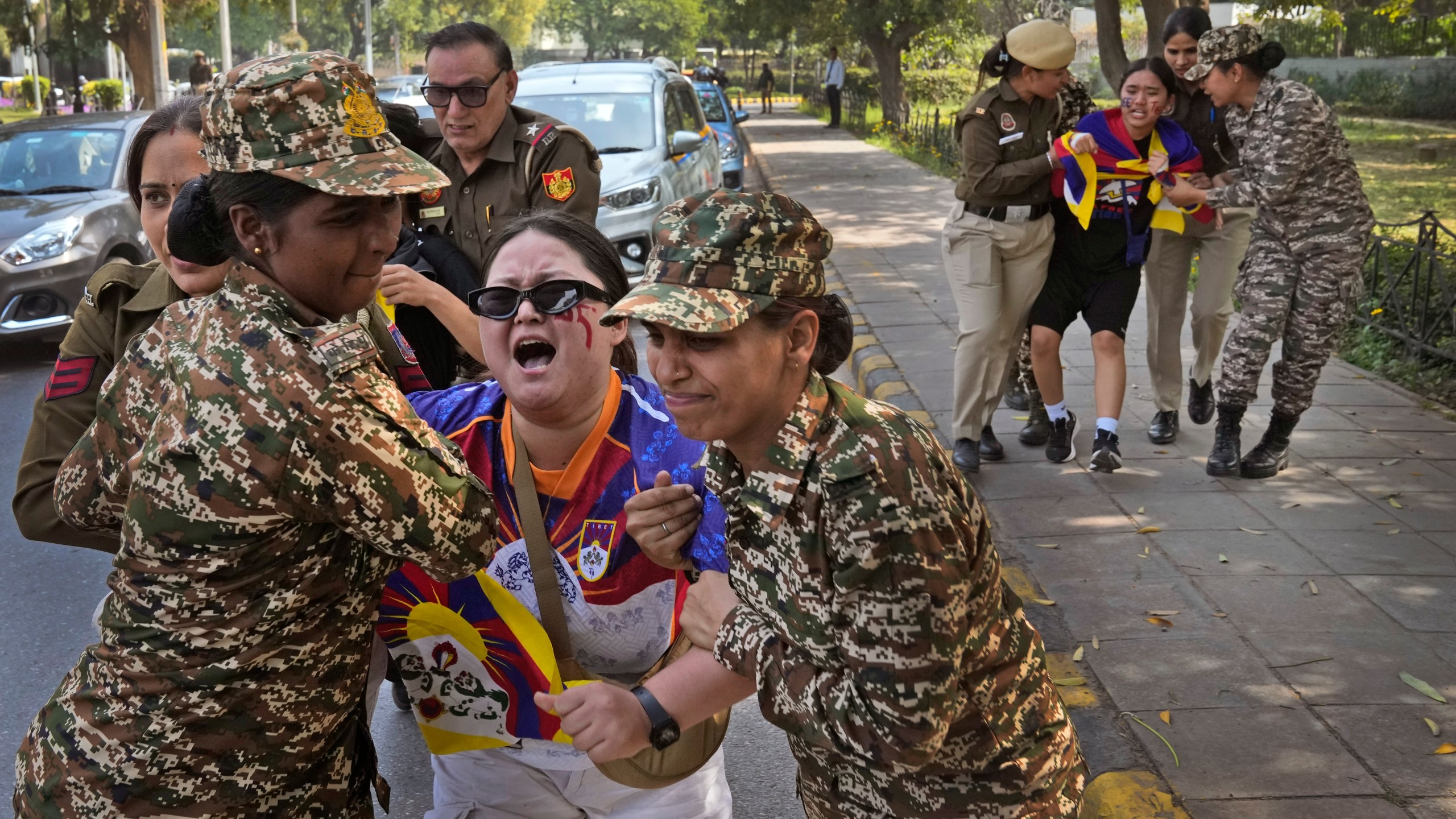 Police detain protesting exile Tibetans during a protest outside Chinese embassy to mark the 1959 uprising in Tibet against the Chinese rule on this day, in New Delhi, India, Monday, March, 10, 2025. (AP Photo/Manish Swarup)