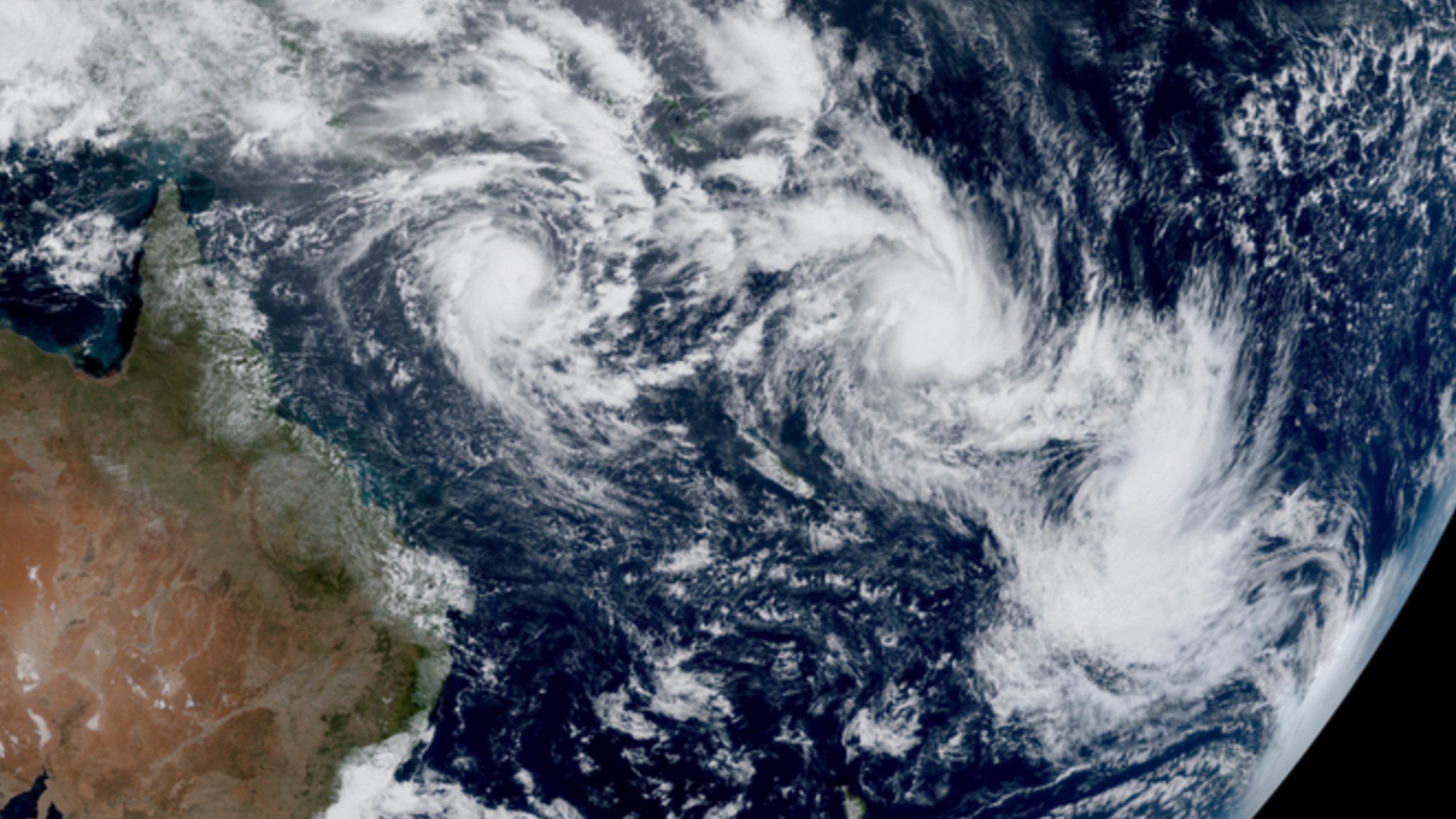 FILE - In this satellite image provided by CSU/CIRA & NOAA taken 1:10 GMT on Feb. 25, 2025, shows three cyclones, from left, Alfred, Seru and Rae east of Australia in the South Pacific. (CSU/CIRA & NOAA via AP, File)