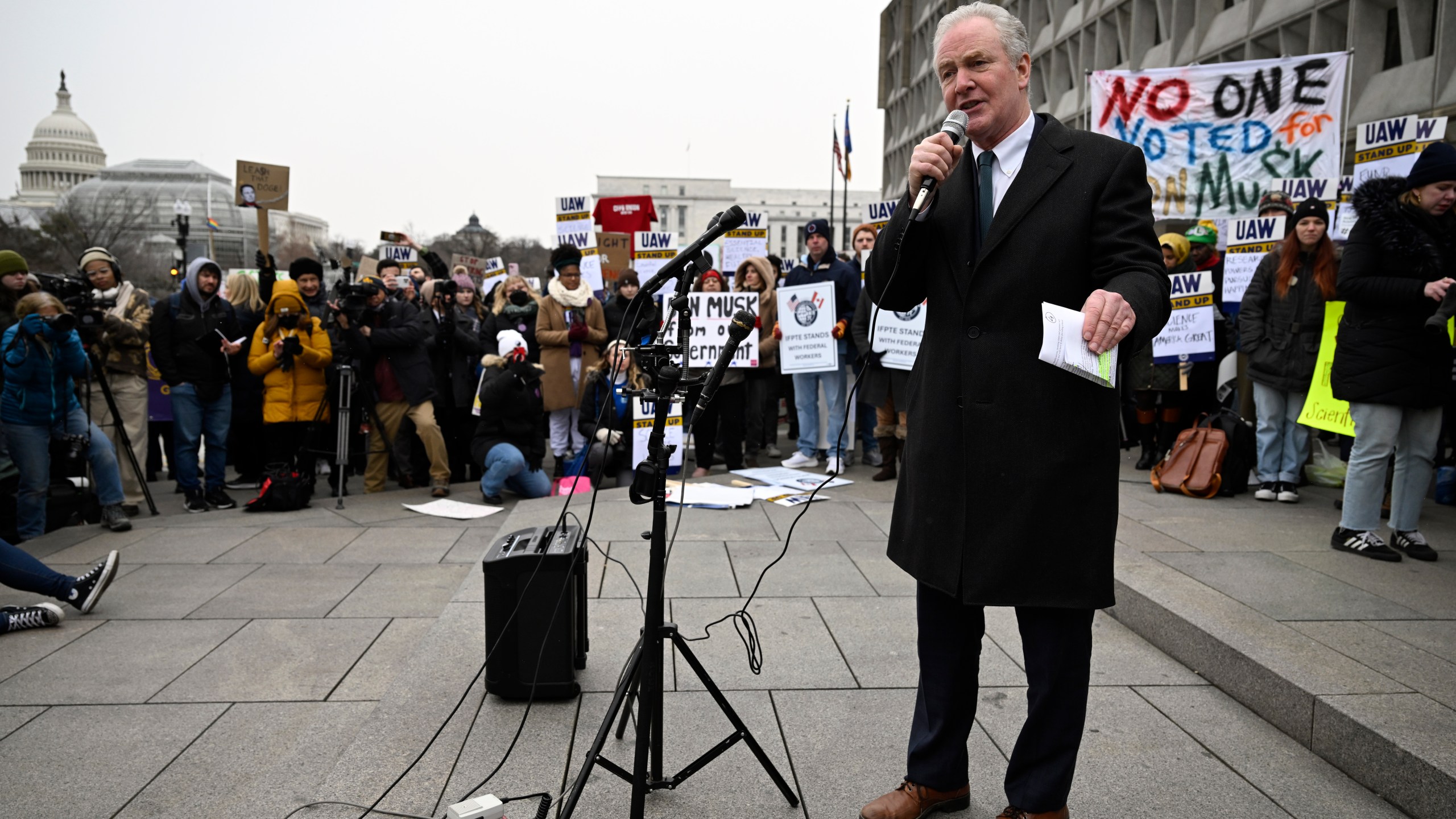 Sen. Chris Van Hollen, D-Md speaks at a rally at Health and Human Services headquarters to protest the polices of President Donald Trump and Elon Musk Wednesday, Feb. 19, 2025, in Washington. (AP Photo/John McDonnell)