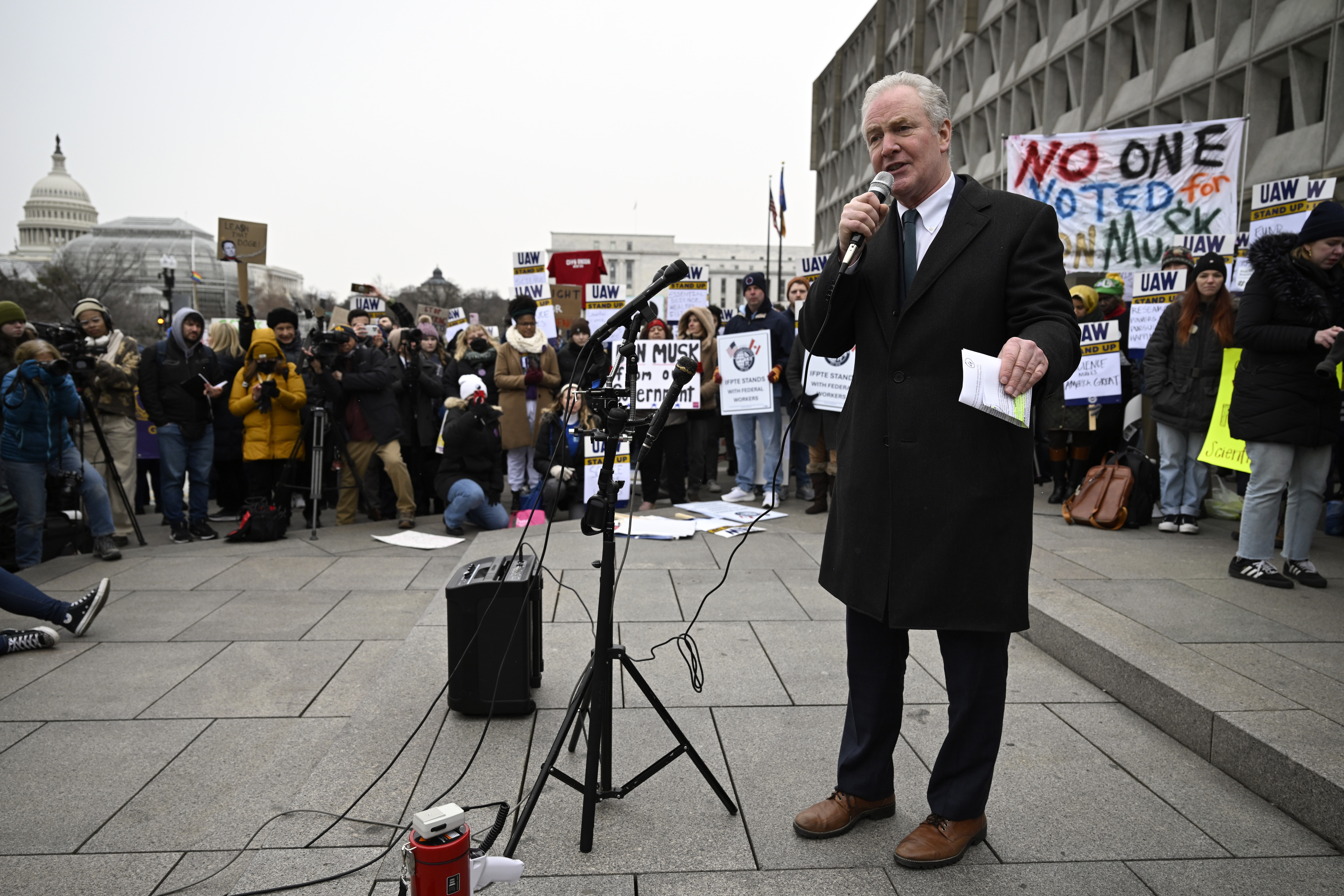 Sen. Chris Van Hollen, D-Md speaks at a rally at Health and Human Services headquarters to protest the polices of President Donald Trump and Elon Musk Wednesday, Feb. 19, 2025, in Washington. (AP Photo/John McDonnell)