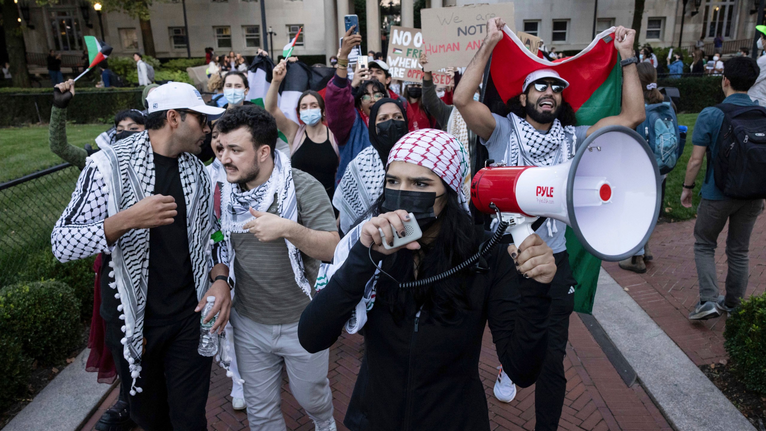 FILE - Palestinian supporters, including Mahmoud Khalil, second from left, demonstrate during a protest at Columbia University, Thursday, Oct. 12, 2023, in New York. (AP Photo/Yuki Iwamura, File)