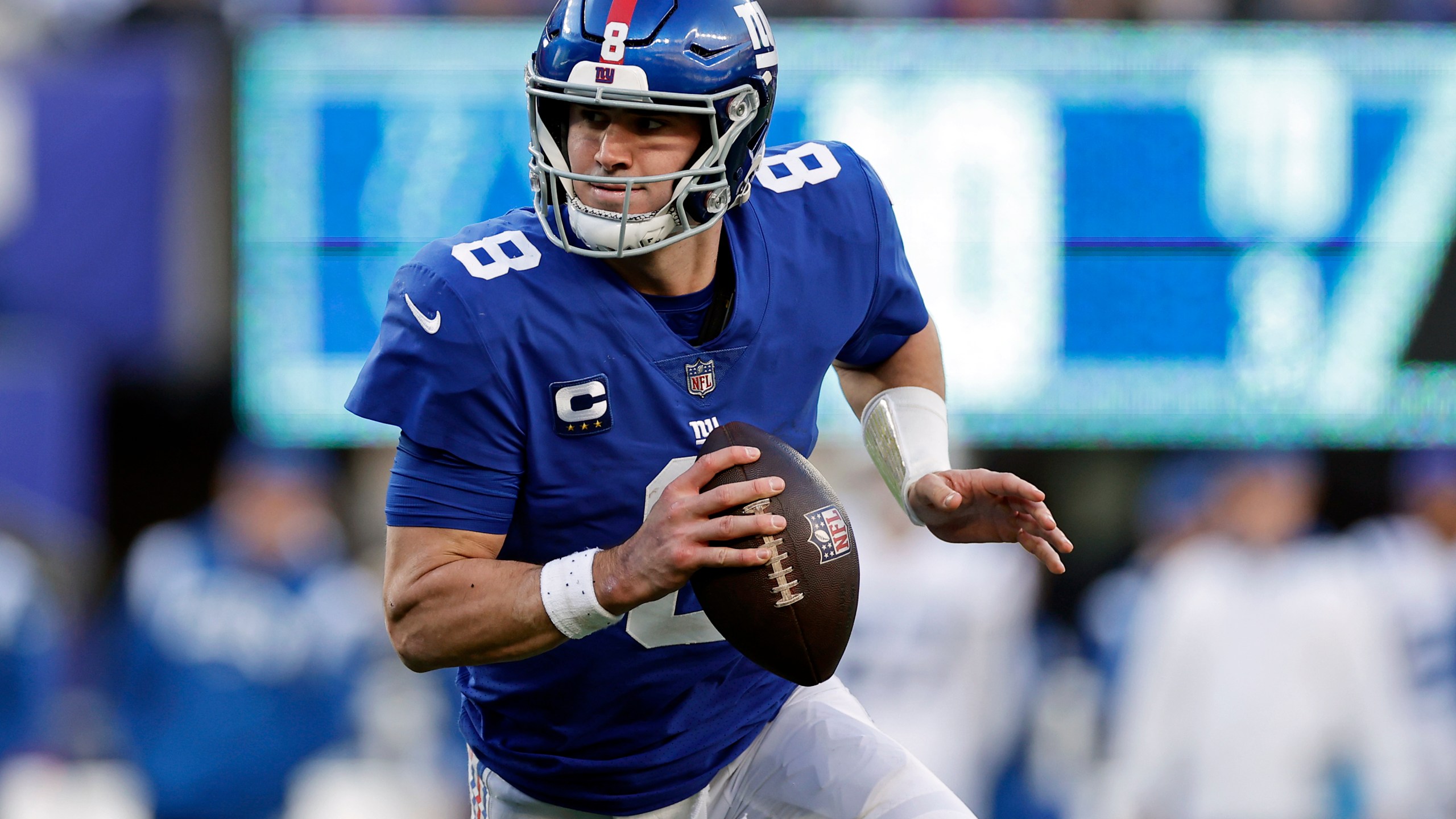 FILE - New York Giants quarterback Daniel Jones runs with the ball against the Indianapolis Colts during an NFL football game, Jan. 1, 2023, in East Rutherford, N.J. (AP Photo/Adam Hunger, file)