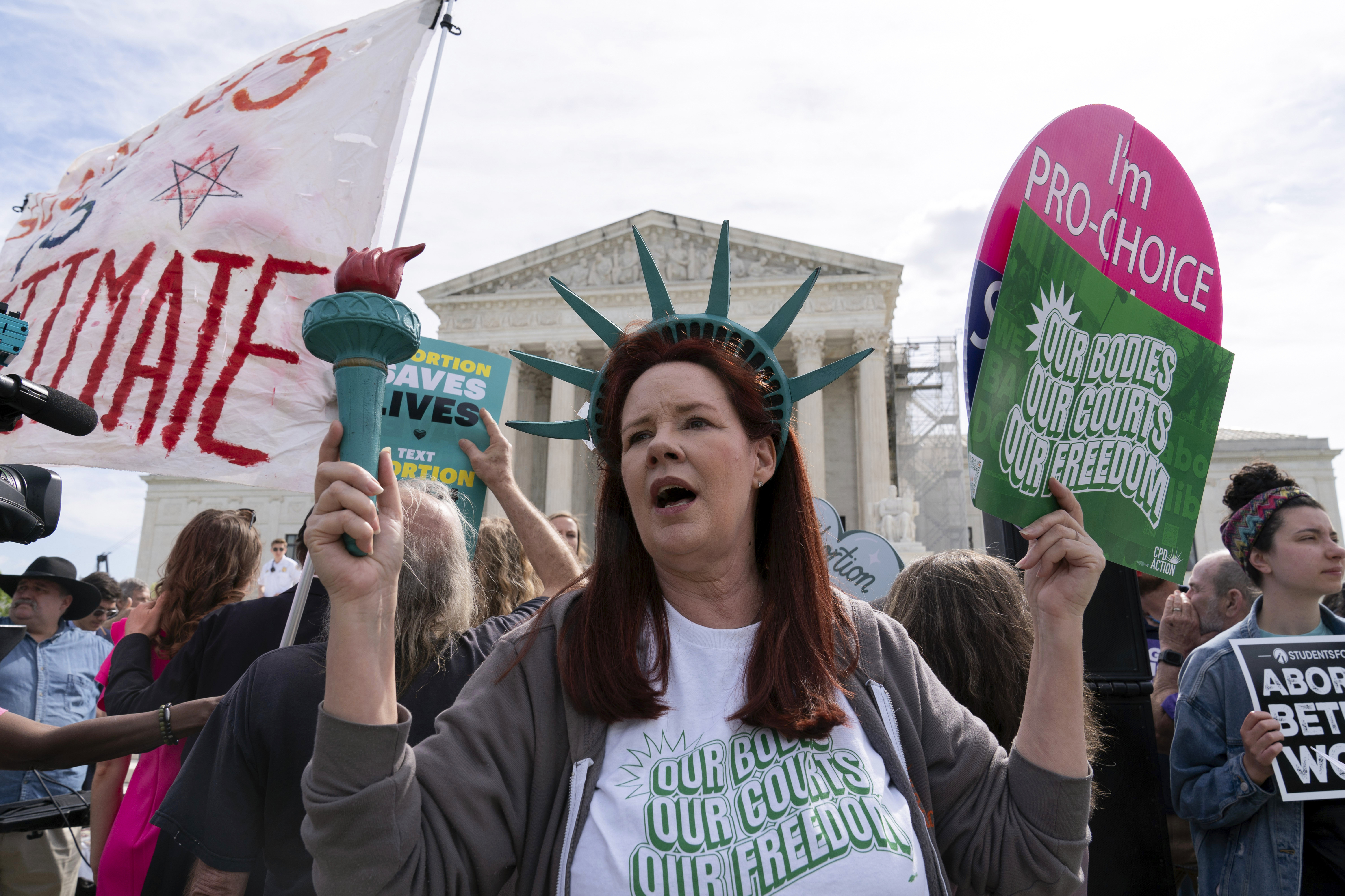 FILE - Abortion-rights activists rally outside the Supreme Court, Wednesday, April 24, 2024, in Washington. (AP Photo/Jose Luis Magana, File)