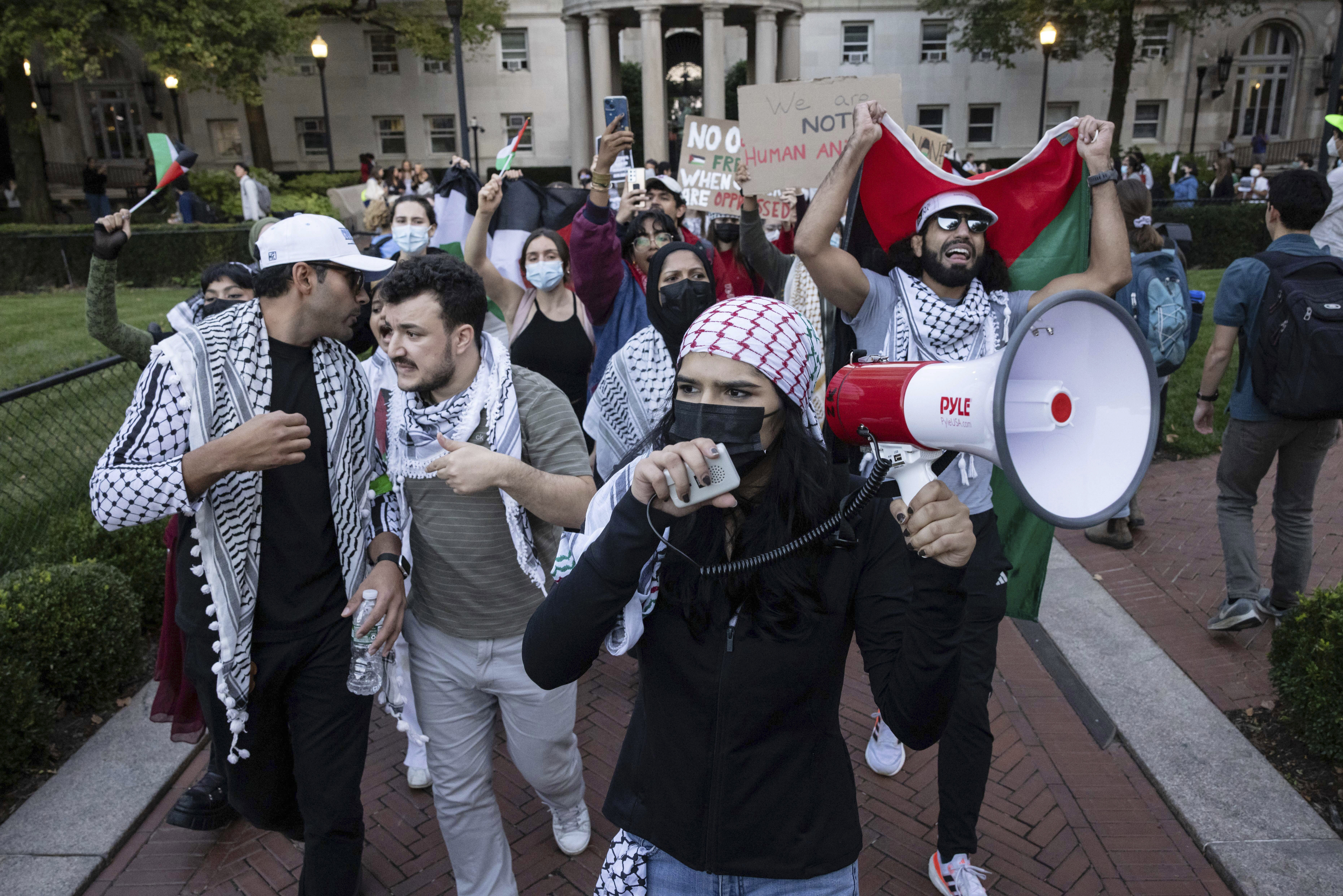 FILE - Palestinian supporters, including Mahmoud Khalil, second from left, demonstrate during a protest at Columbia University, Thursday, Oct. 12, 2023, in New York. (AP Photo/Yuki Iwamura, File)