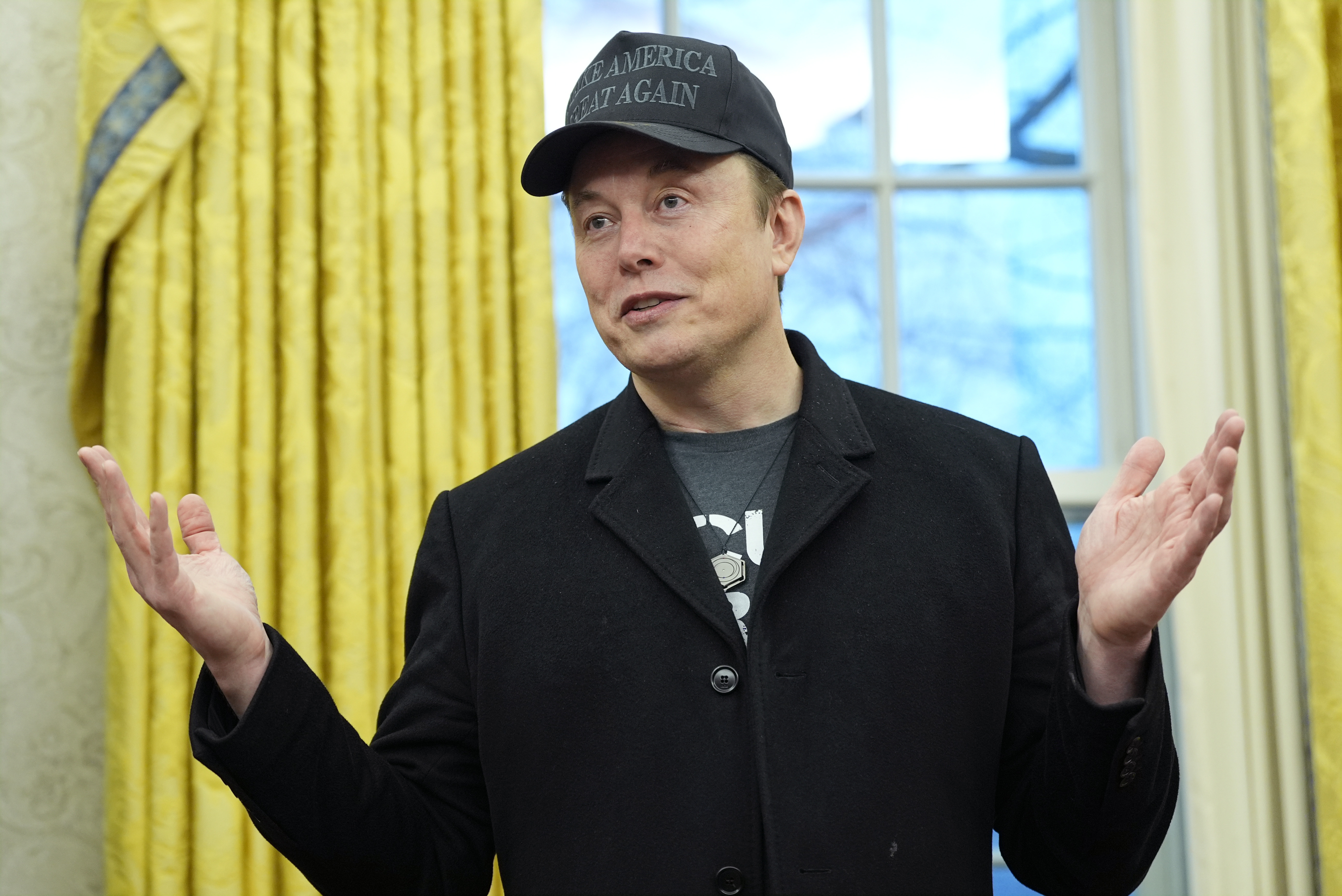 FILE - Elon Musk speaks during an event with President Donald Trump in the Oval Office at the White House, Feb. 11, 2025, in Washington. (AP Photo/Alex Brandon)