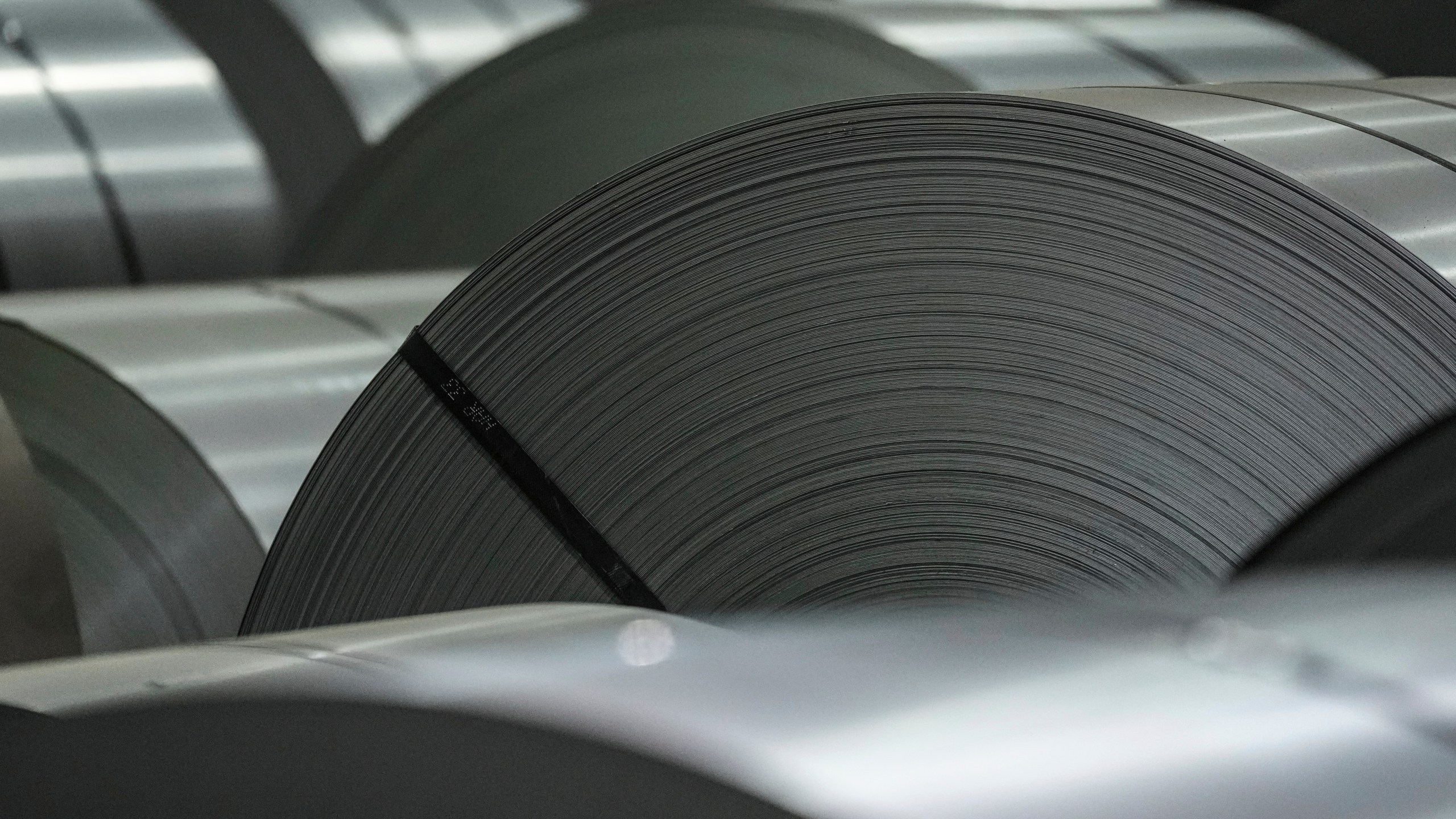 Coils of steel are seen at the ArcelorMittal Dofasco Steel Plant in Hamilton, Ontario, Friday, Feb. 14, 2025. (Chris Young/The Canadian Press via AP)