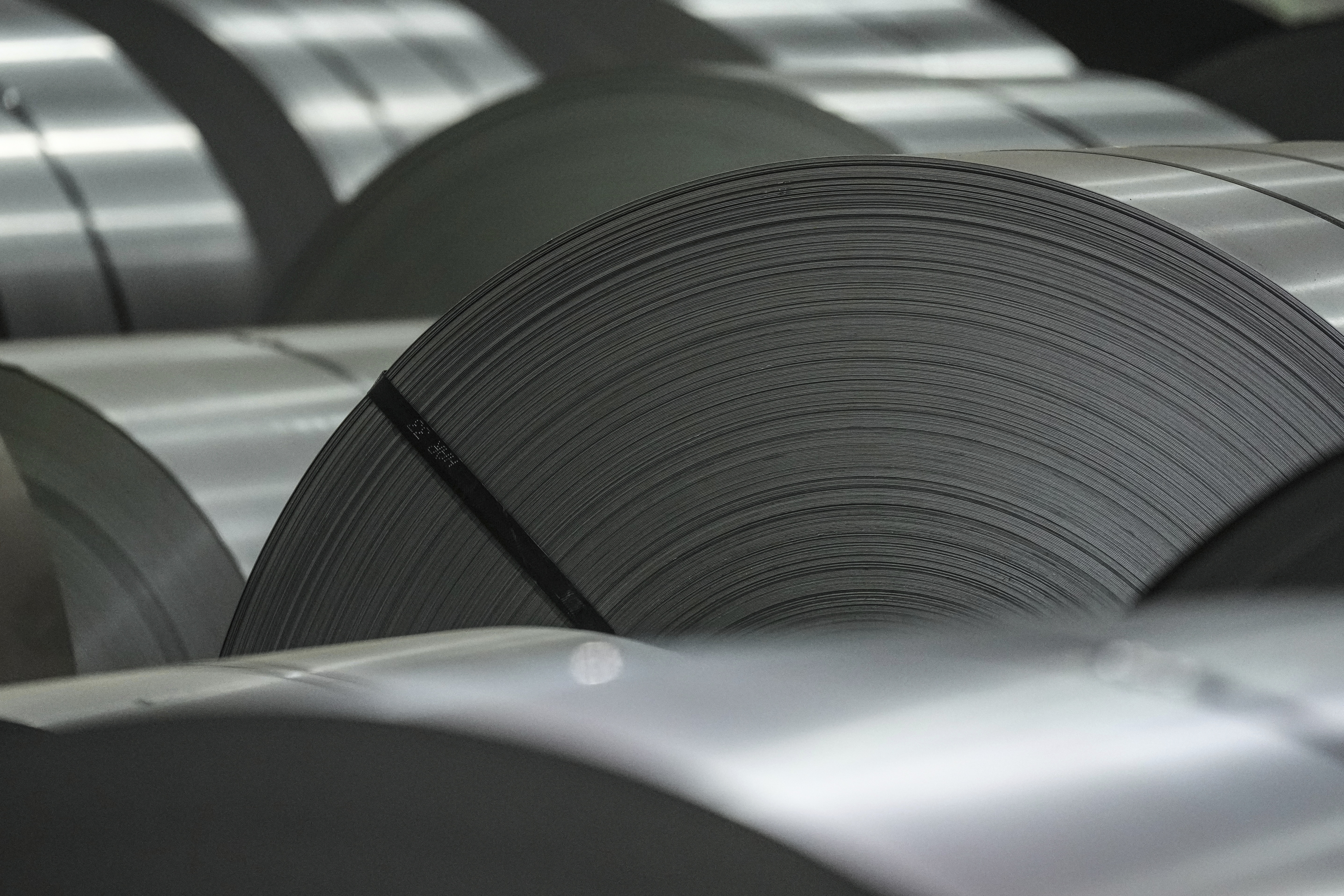 Coils of steel are seen at the ArcelorMittal Dofasco Steel Plant in Hamilton, Ontario, Friday, Feb. 14, 2025. (Chris Young/The Canadian Press via AP)