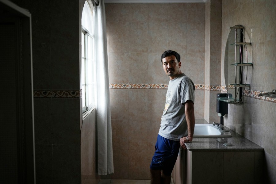 Afghan migrant Hayatullah Omagh poses for a portrait in Panama City, Monday, March 10, 2025, after being deported from the United States, detained for weeks in a Panamanian immigration camp and released on a temporary humanitarian visa allowing a 30‑day stay. (AP Photo/Matias Delacroix)