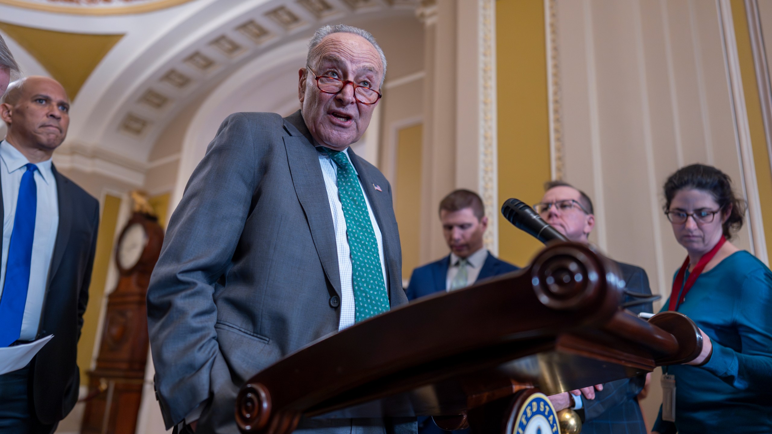 Senate Minority Leader Chuck Schumer, D-N.Y., speaks with reporters as Republicans work to pass an interim spending bill that would avoid a partial government shutdown and keep federal agencies funded through September, at the Capitol in Washington, Tuesday, March 11, 2025. (AP Photo/J. Scott Applewhite)