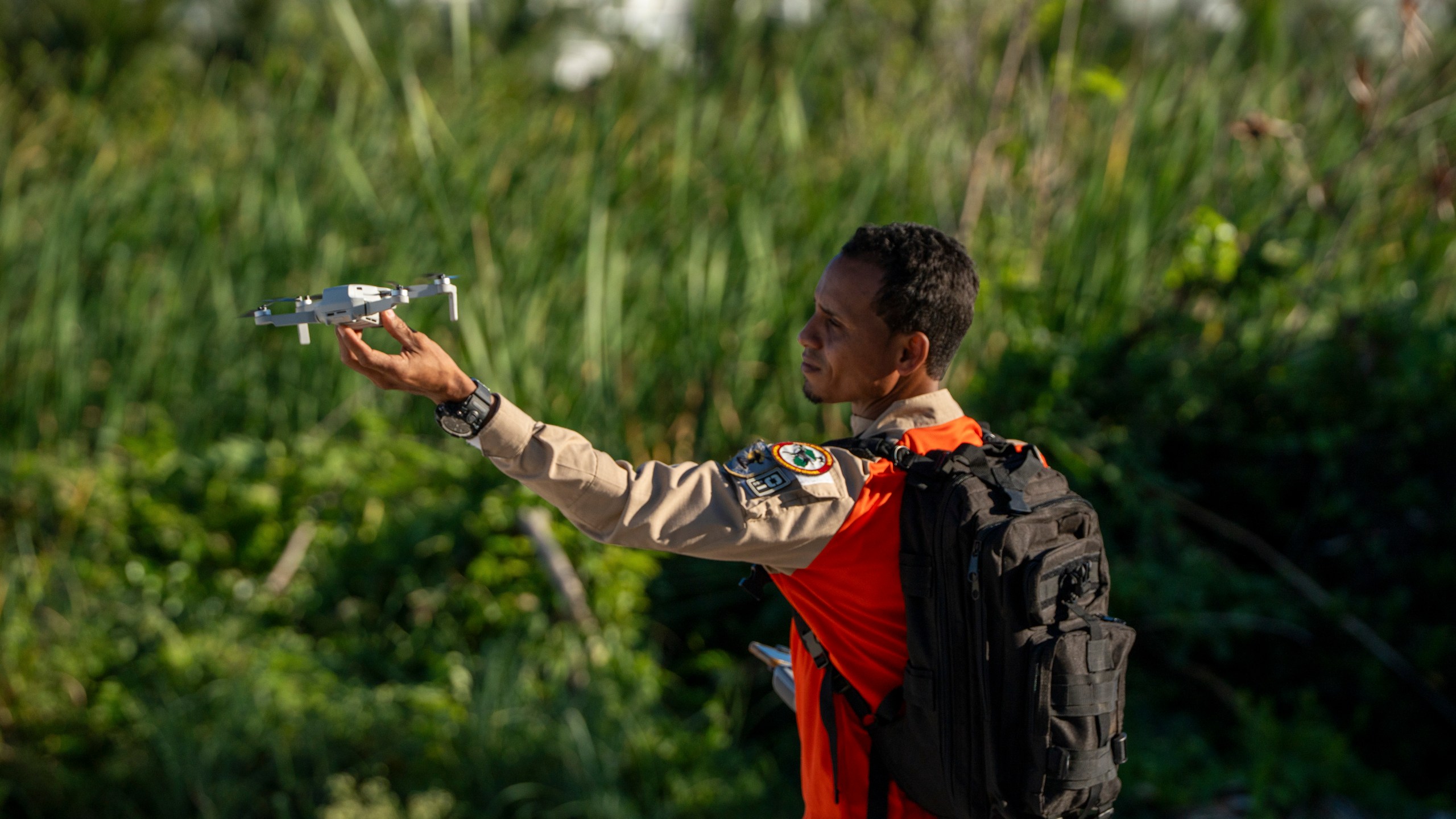 A drone pilot searches for Sudiksha Konanki, a university student from the U.S. who disappeared on a beach in Punta Cana, Dominican Republic, Monday, March. 10, 2025. (AP Photo/Francesco Spotorno)