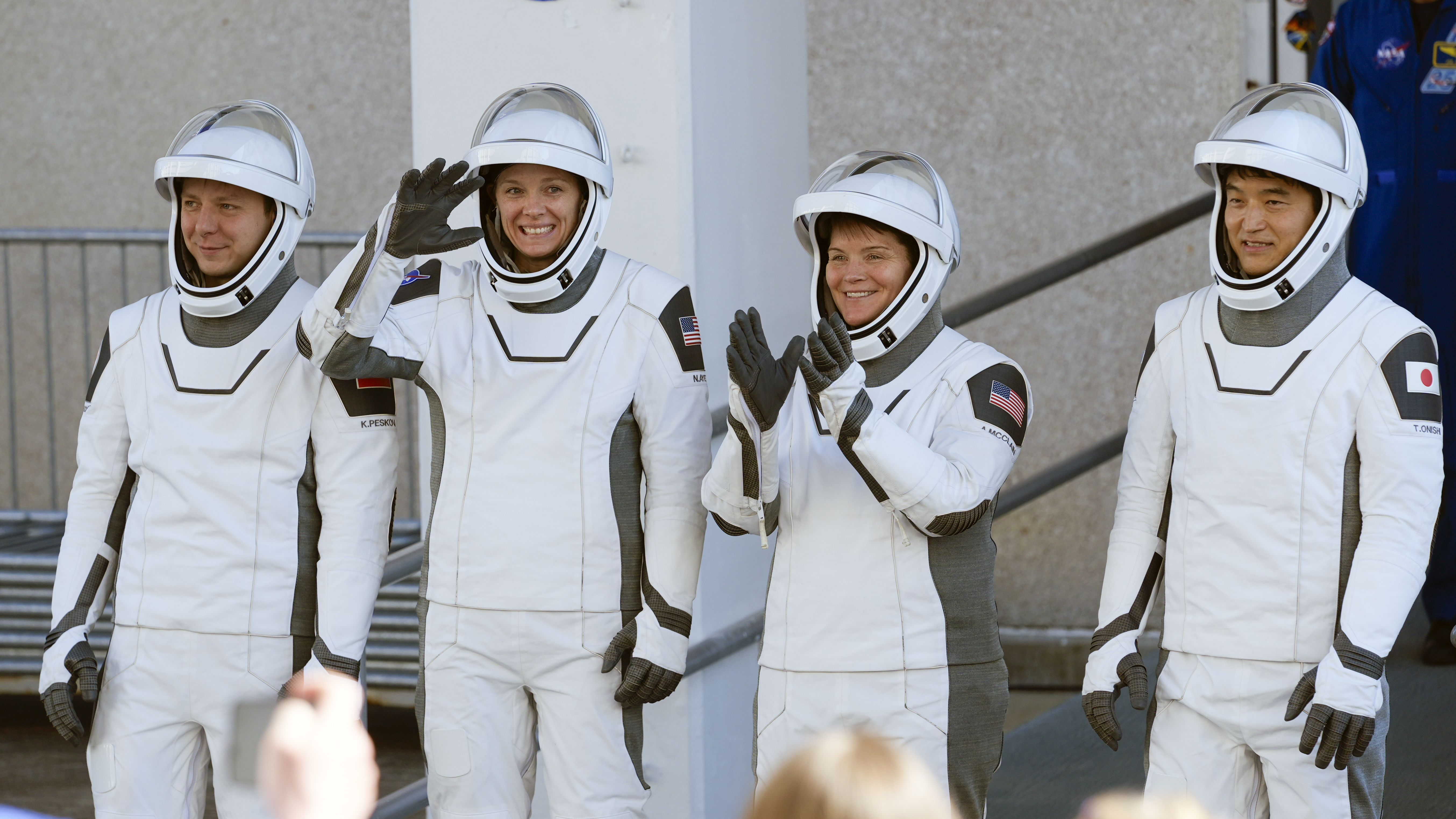 Crew 10, from left, cosmonaut Kirill Peskov, astronaut Nichole Ayers, astronaut Anne McClain and JAXA astronaut Takuya Onishi leave the Operations and Checkout building before heading to Launch Pad 39-A at the Kennedy Space Center in Cape Canaveral, Fla., for a mission to the International Space Station, Wednesday, March 12, 2025. (AP Photo/John Raoux)