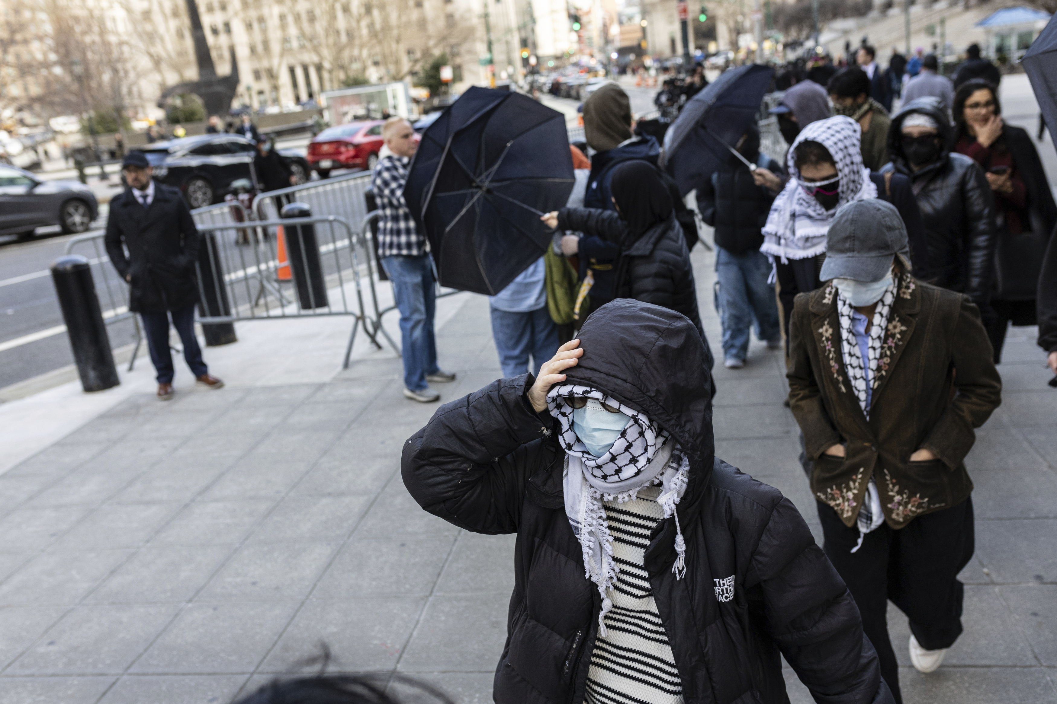 Students from Columbia University arrive at the Manhattan federal court prior to the deportation case of Mahmoud Khalil, Wednesday, March 12, 2025, in New York. (AP Photo/Stefan Jeremiah)