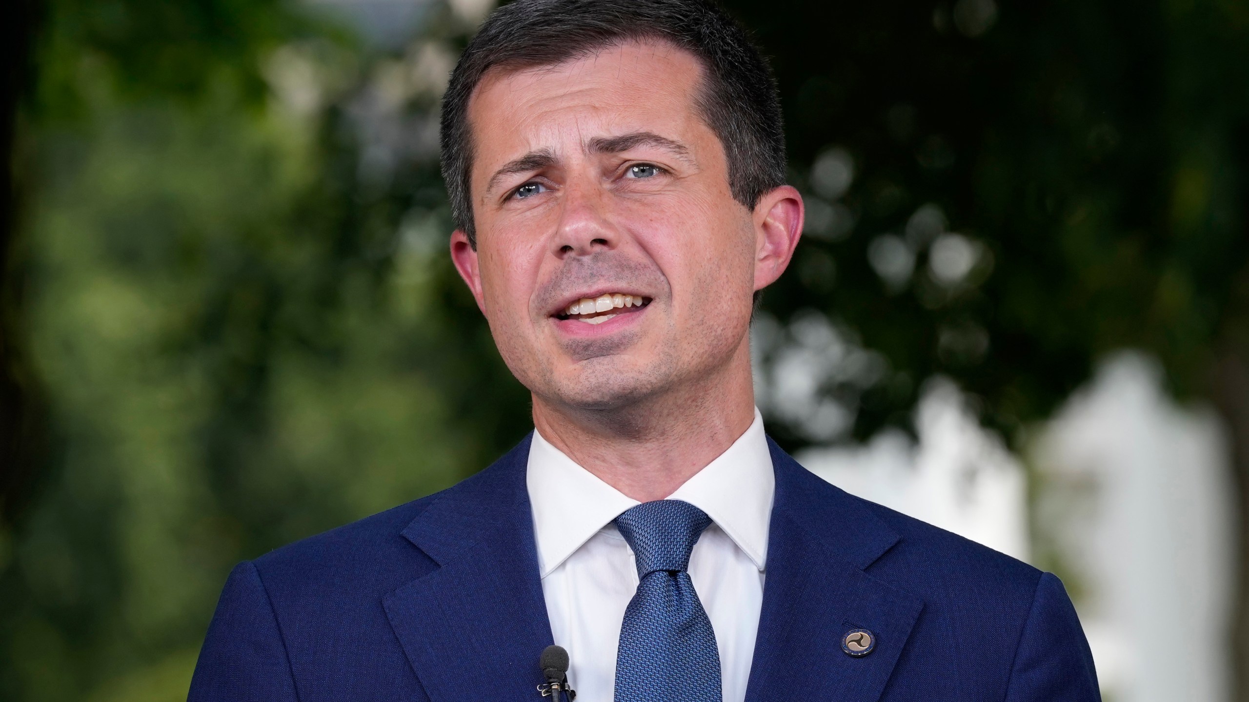 FILE - Transportation Secretary Pete Buttigieg talks with reporters at the White House in Washington, July 23, 2024. (AP Photo/Susan Walsh, FIle)