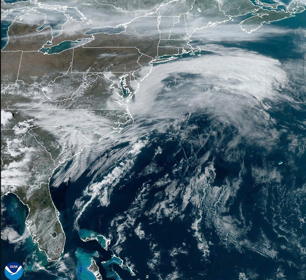 This satellite image from NOAA shows a March megastorm building across the United States, Thursday, March 13, 2025. (NOAA via AP)