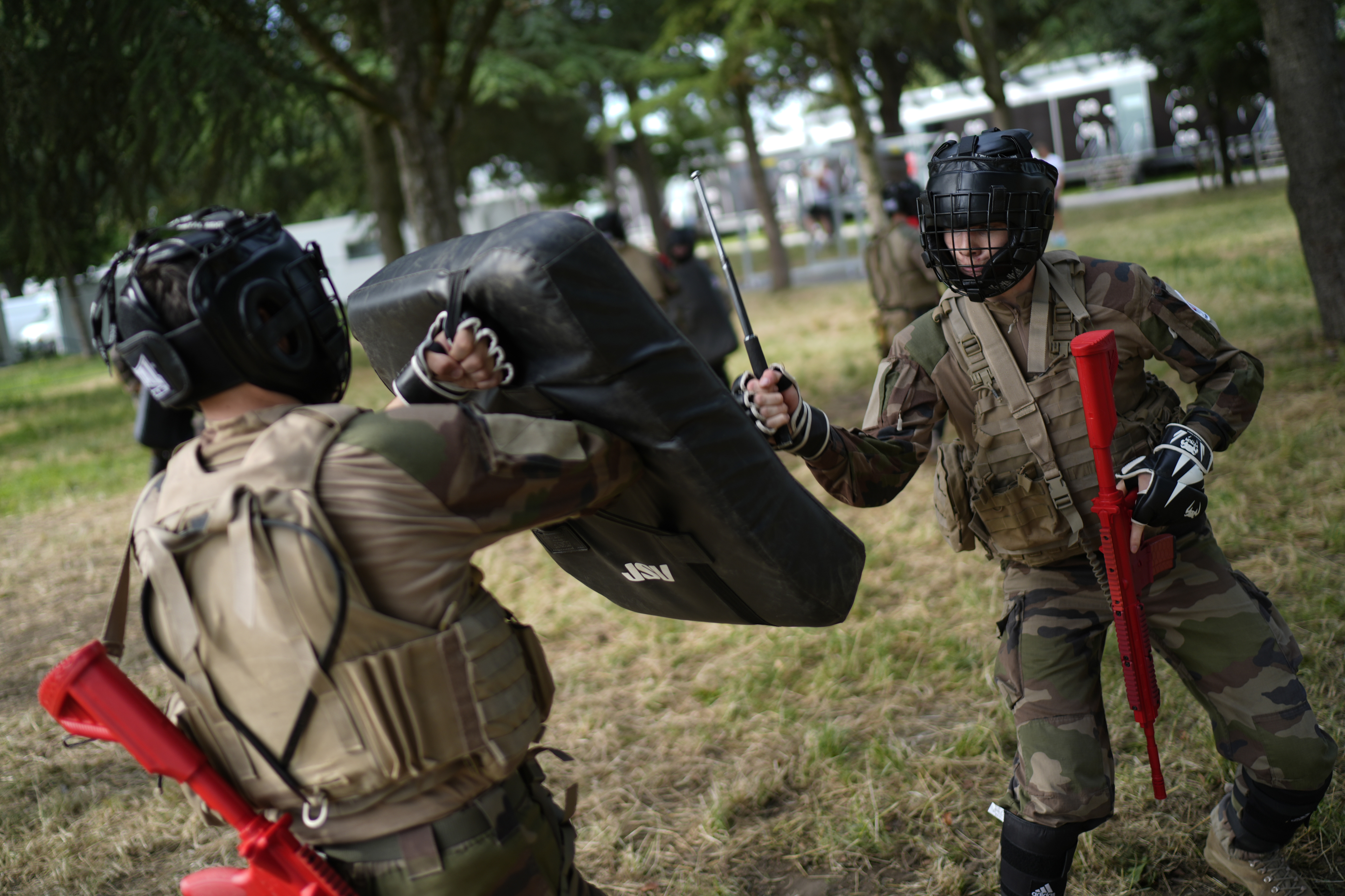 FILE - Soldiers demonstrate operational technics for close combat in a training class at a military camp set up for the Paris Olympic games, July 19, 2024, Vincennes, just outside Paris, France. (AP Photo/David Goldman, File)