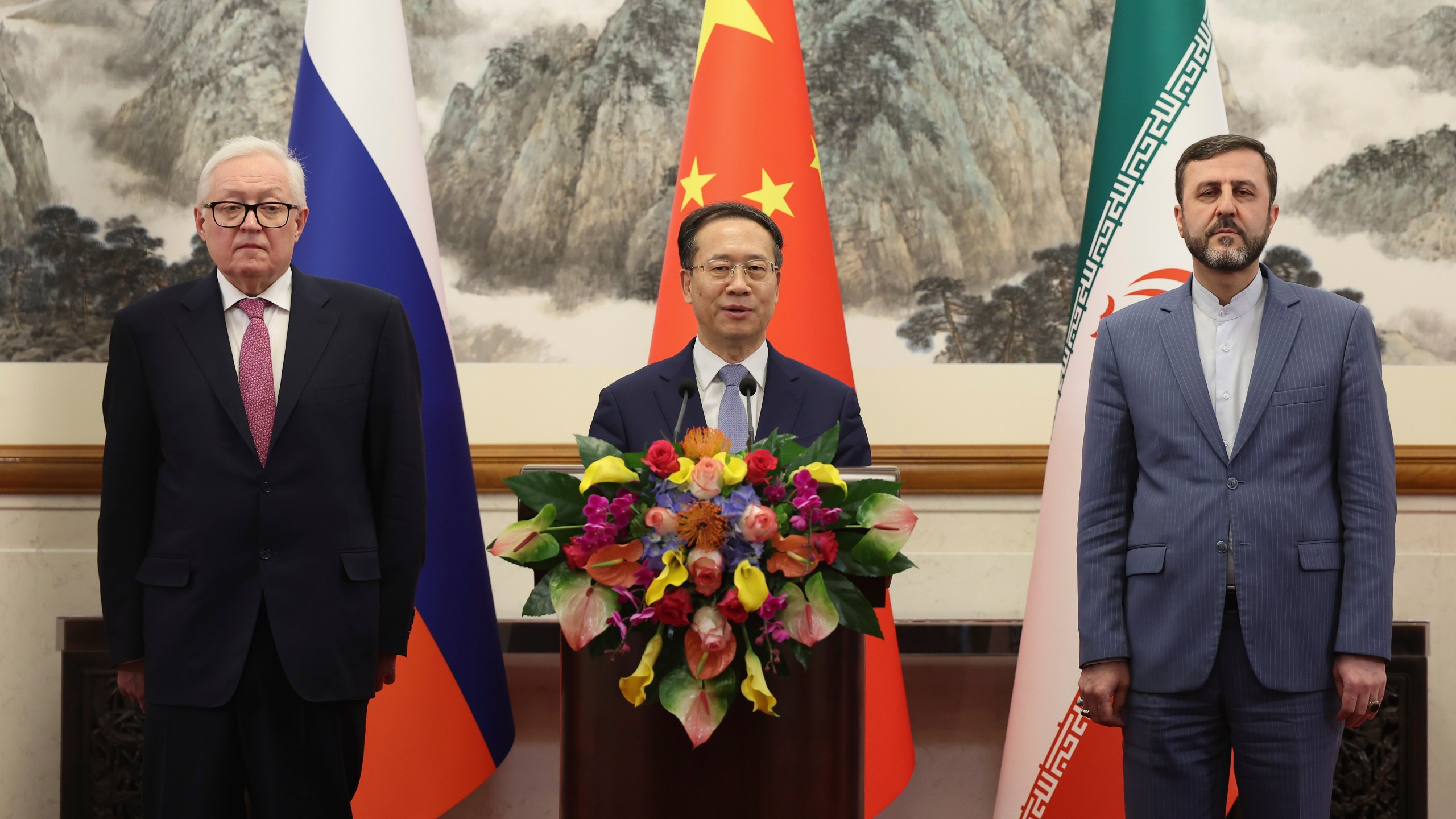 From left, Russian Deputy Foreign Minister Sergei Ryabkov, Chinese Vice Foreign Minister Ma Zhaoxu and Iranian Deputy Foreign Minister Kazem Gharibabadi, meet with reporters after their meeting at Diaoyutai State Guest House on March 14, 2025 in Beijing, China. (Lintao Zhang/Pool Photo via AP)