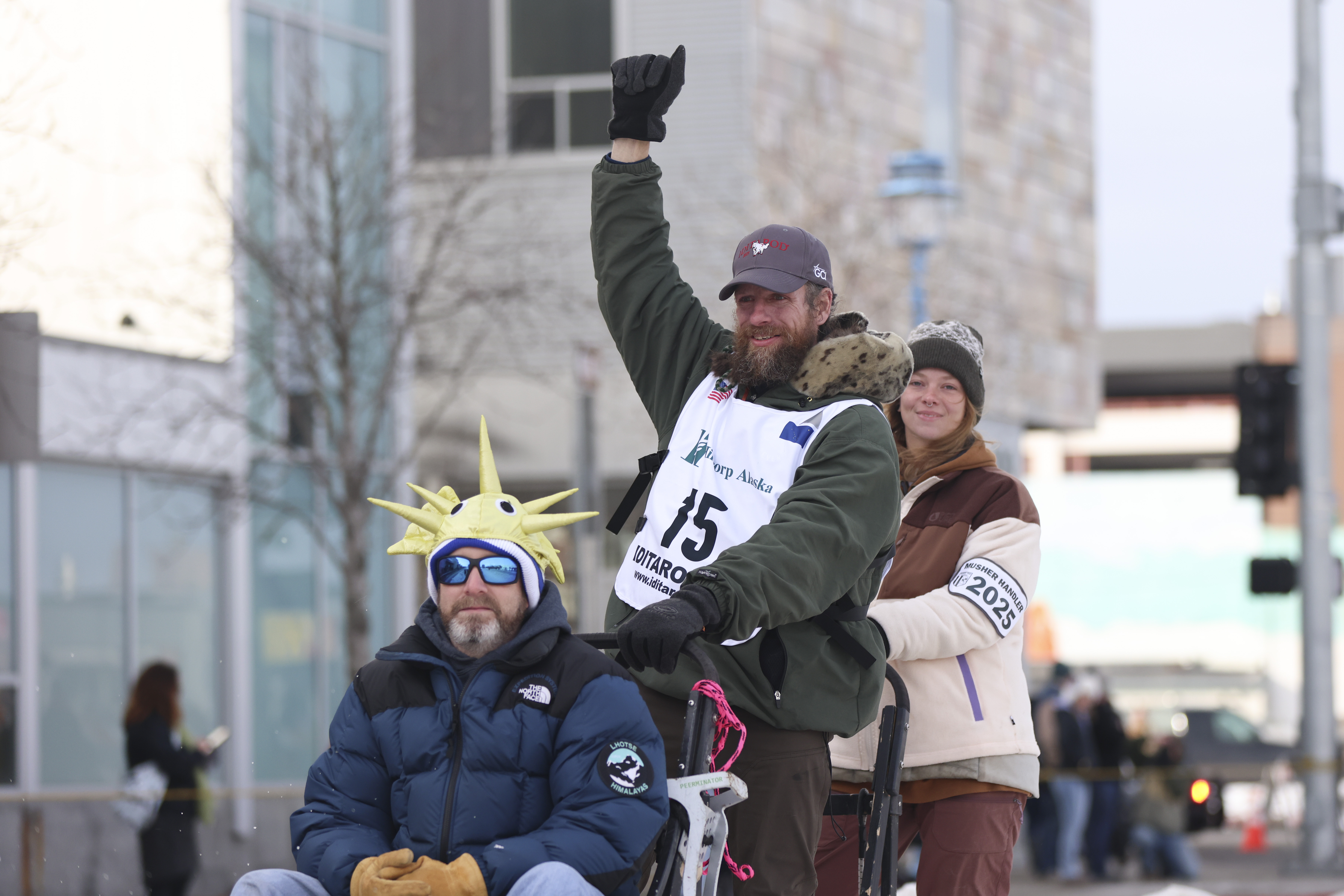 FILE - Jessie Holmes (15), of Alabama, mushes down Fourth Street during the Ceremonial Start of the Iditarod Trail Sled Dog Race in Anchorage, Alaska., Saturday, March 1, 2025. (AP Photo/Amanda Loman, File)