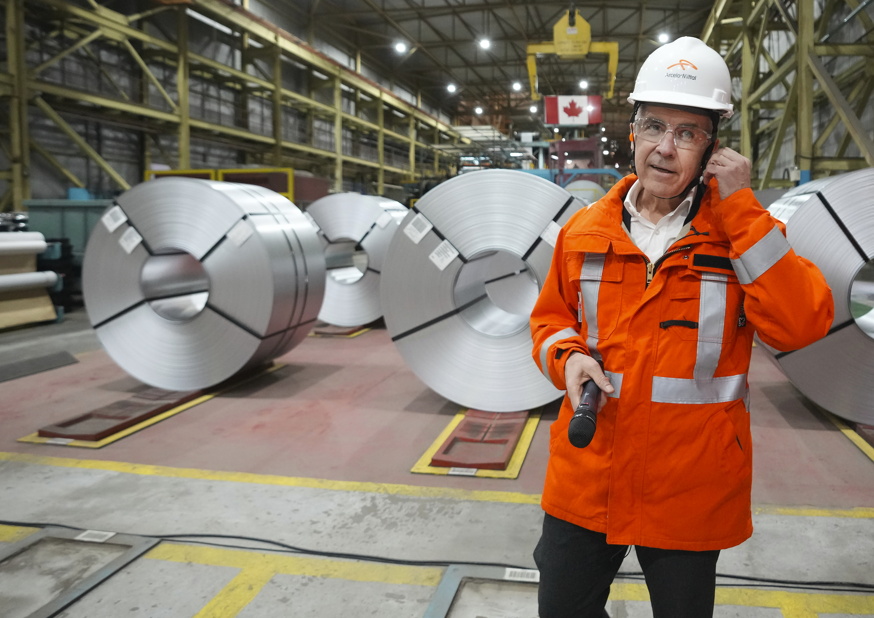 Canadian Prime Minister designate Mark Carney tours the ArcelorMittal Dofasco steel plant in Hamilton, Ontario, on Wednesday, March 12, 2025. (Nathan Denette/The Canadian Press via AP)