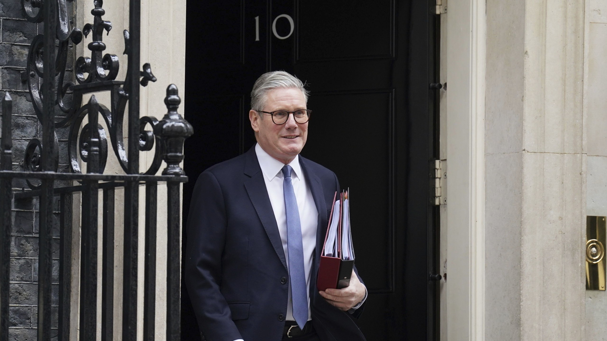 Prime Minister Sir Keir Starmer departs 10 Downing Street to attend Prime Minister's Questions at the Houses of Parliament in London, England, Wednesday, March 12, 2025. (Stefan Rousseau/PA via AP)