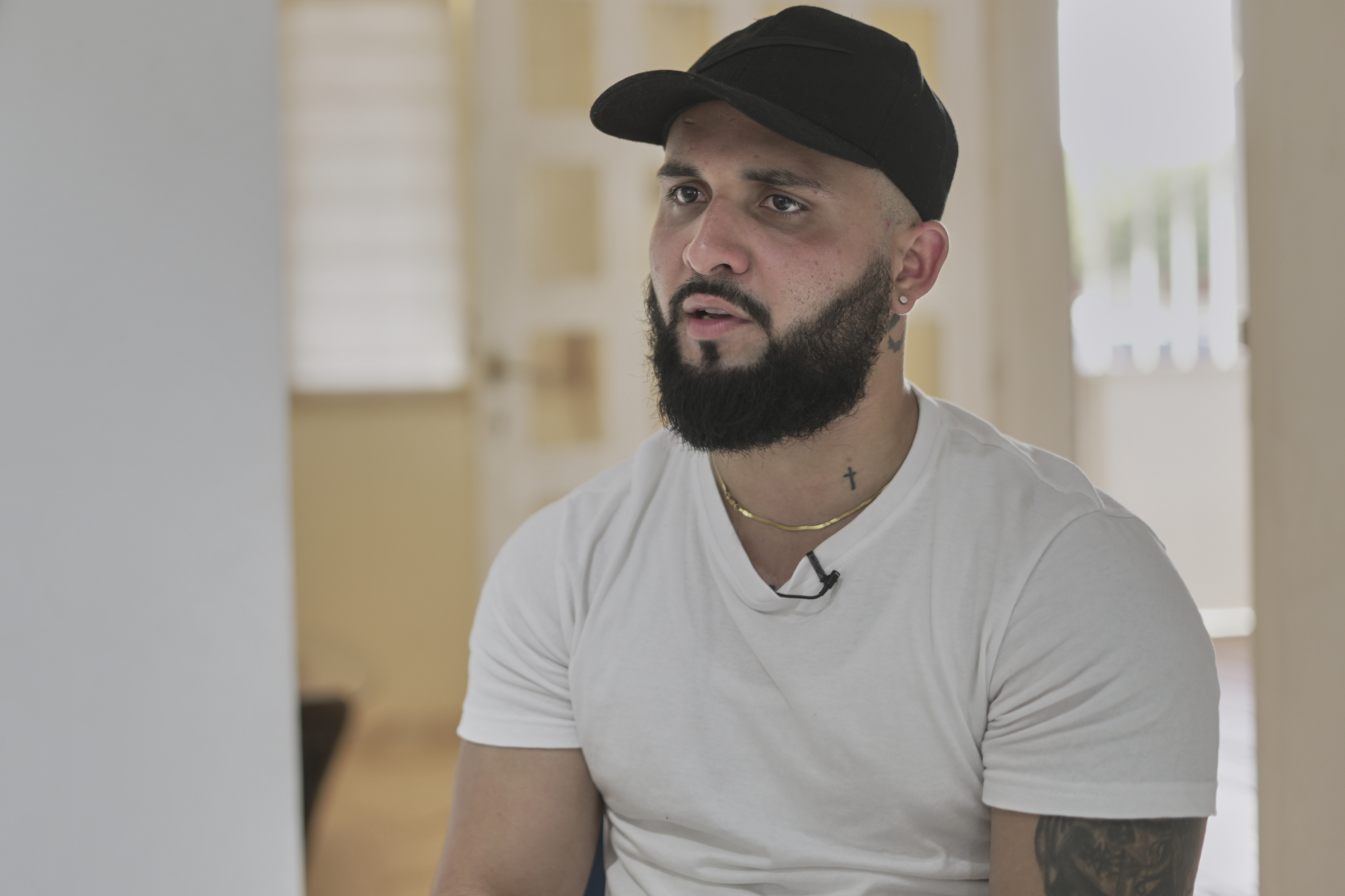 Jhoan Bastidas gives an interview at his father's house in Maracaibo, Venezuela, Wednesday, March 5, 2025, after being deported from Guantanamo Bay Naval Base. (AP Photo/Juan Arraez)