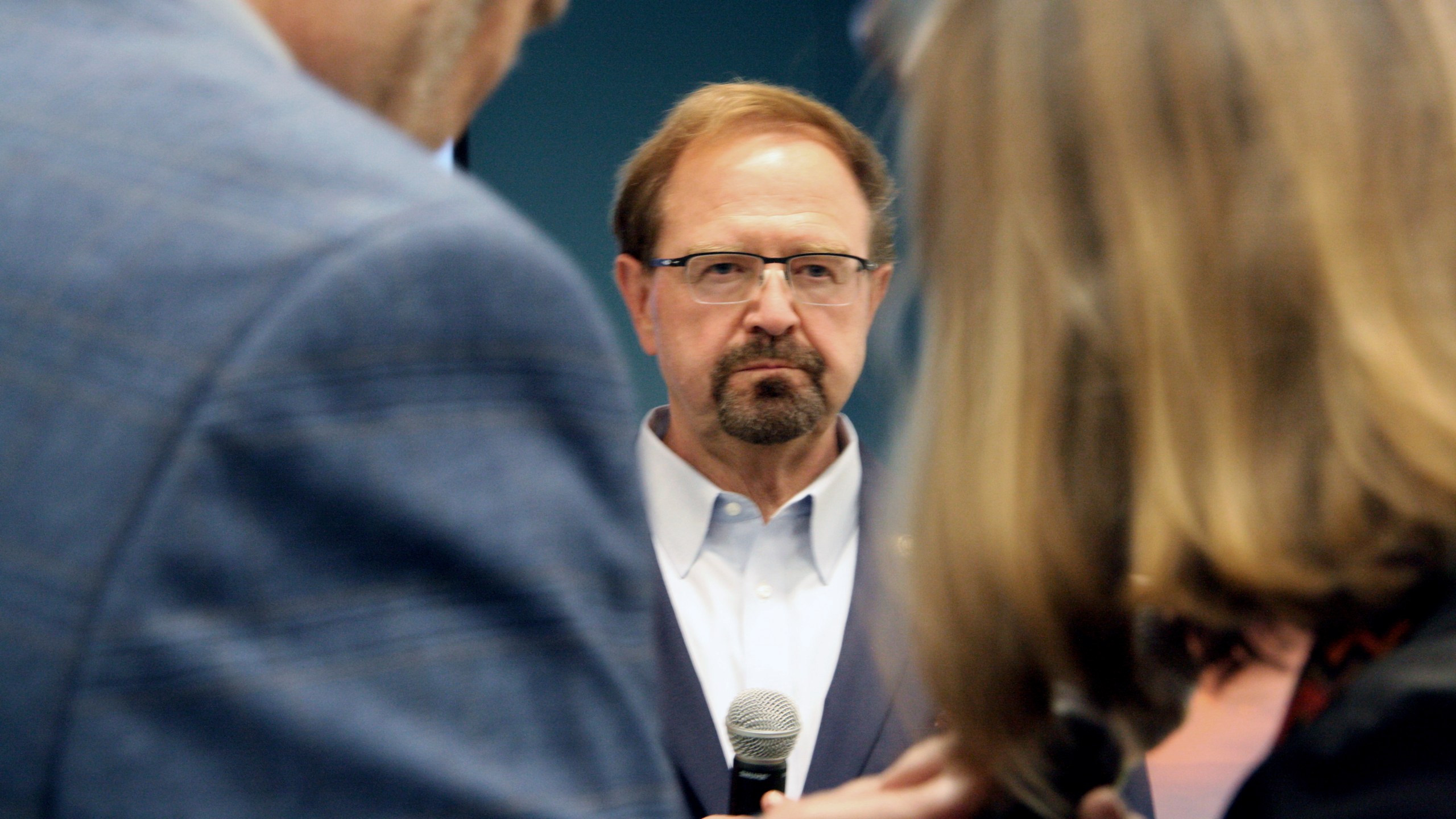 Rep. Chuck Edwards talks during a town hall in Asheville, N.C. on Thursday, March 13, 2025. (AP Photo/Makiya Seminera)