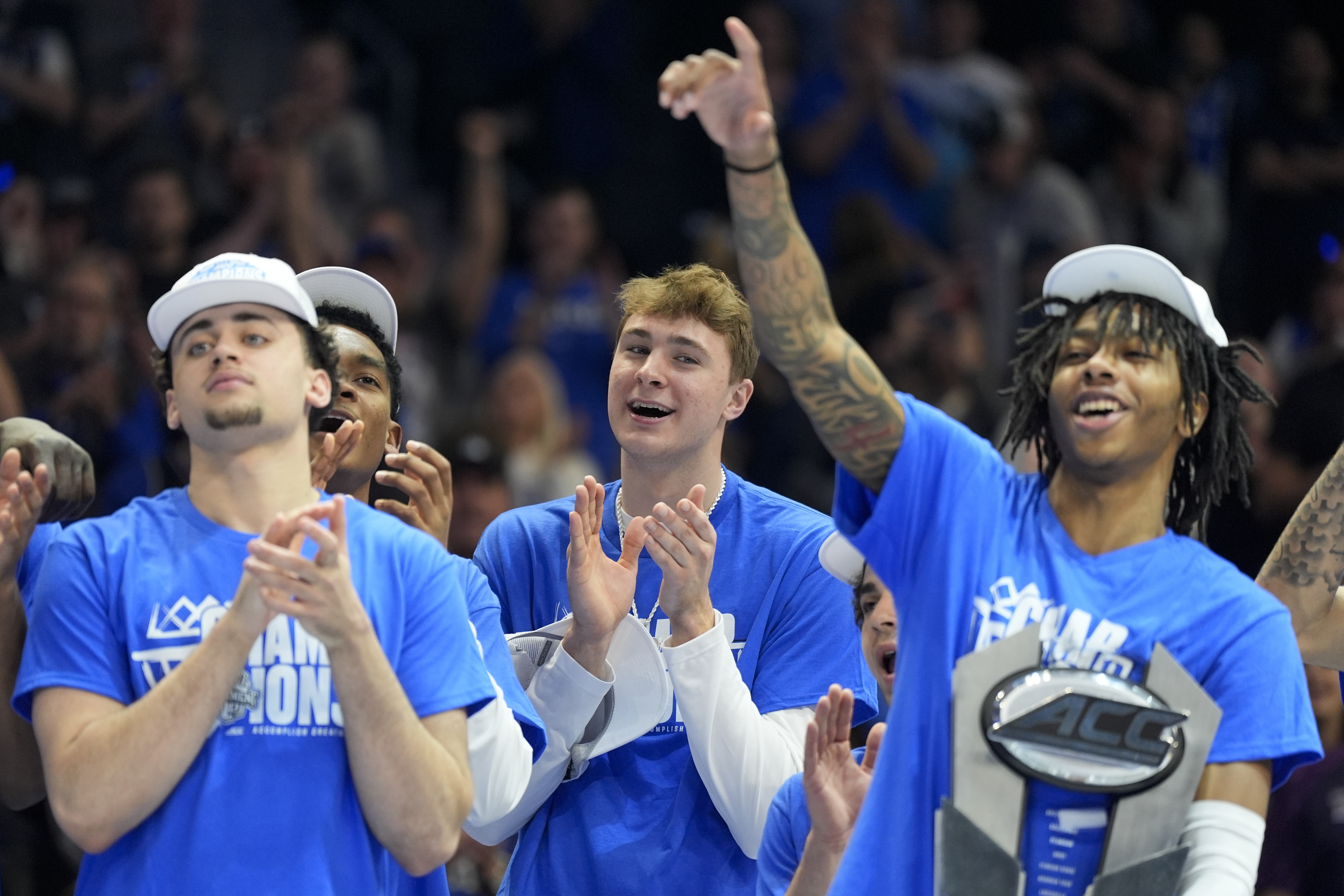 Duke forward Cooper Flagg celebrates after their win against Louisville after an NCAA college basketball game in the championship of the Atlantic Coast Conference tournament, Saturday, March 15, 2025, in Charlotte, N.C. (AP Photo/Chris Carlson)